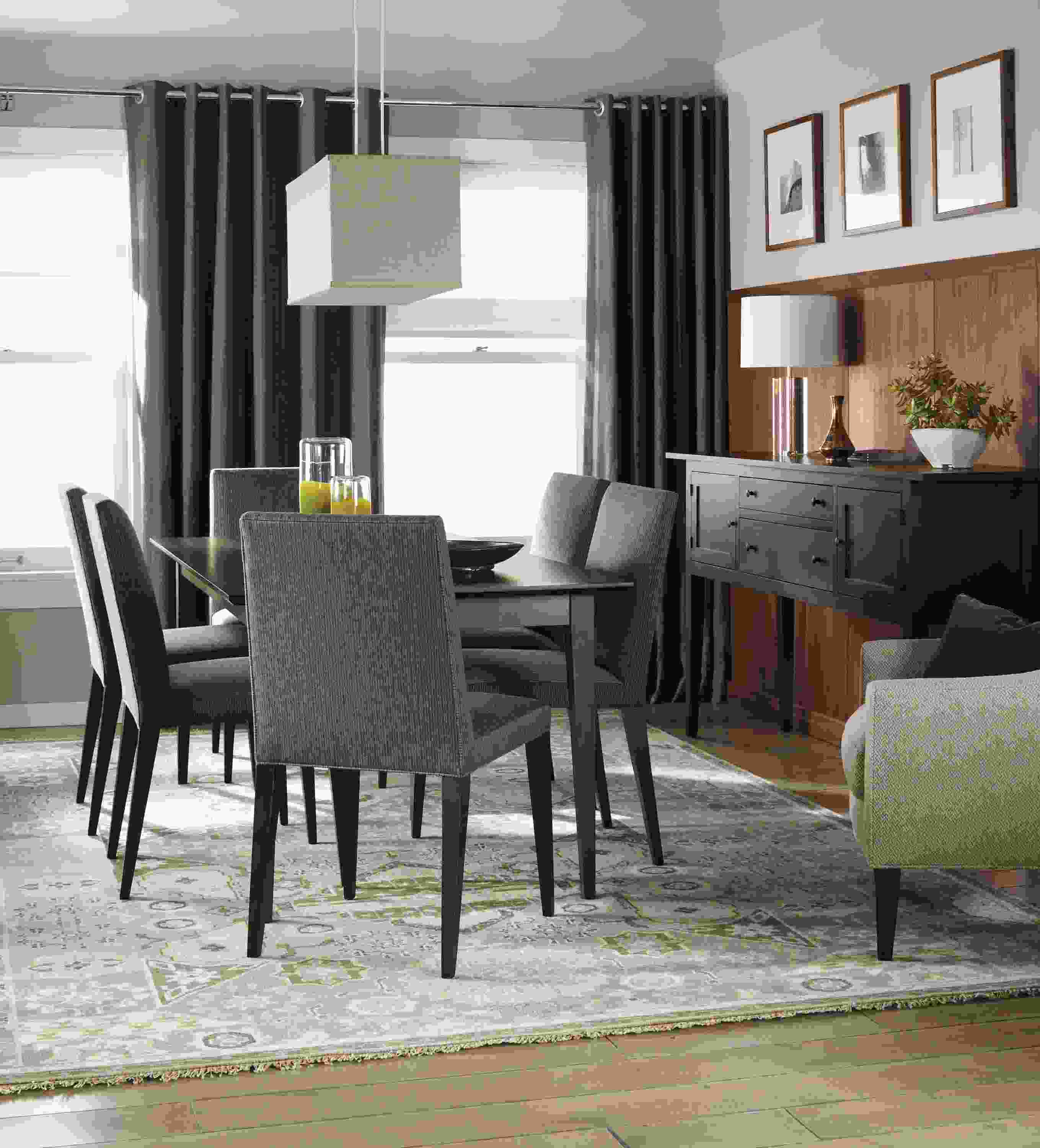 Living room with Adams storage cabinet and table in charcoal.
