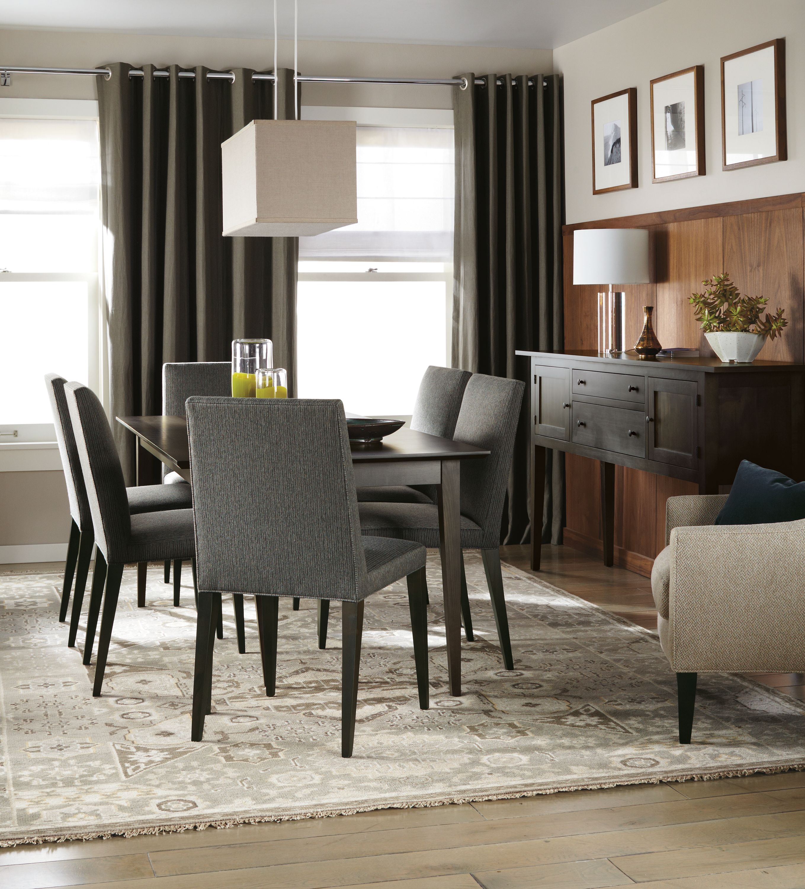 Living room with Adams storage cabinet and table in charcoal.