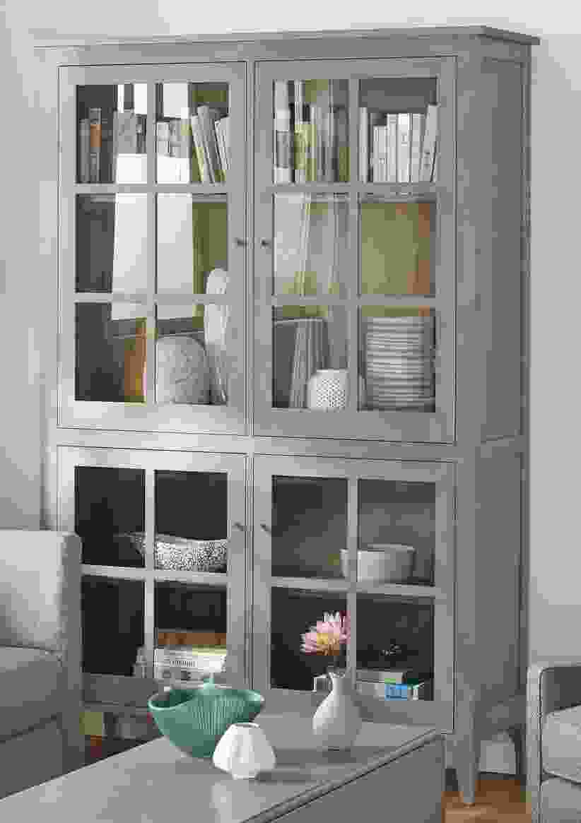 Living room with Adams 50-wide glass storage cabinet in shell.