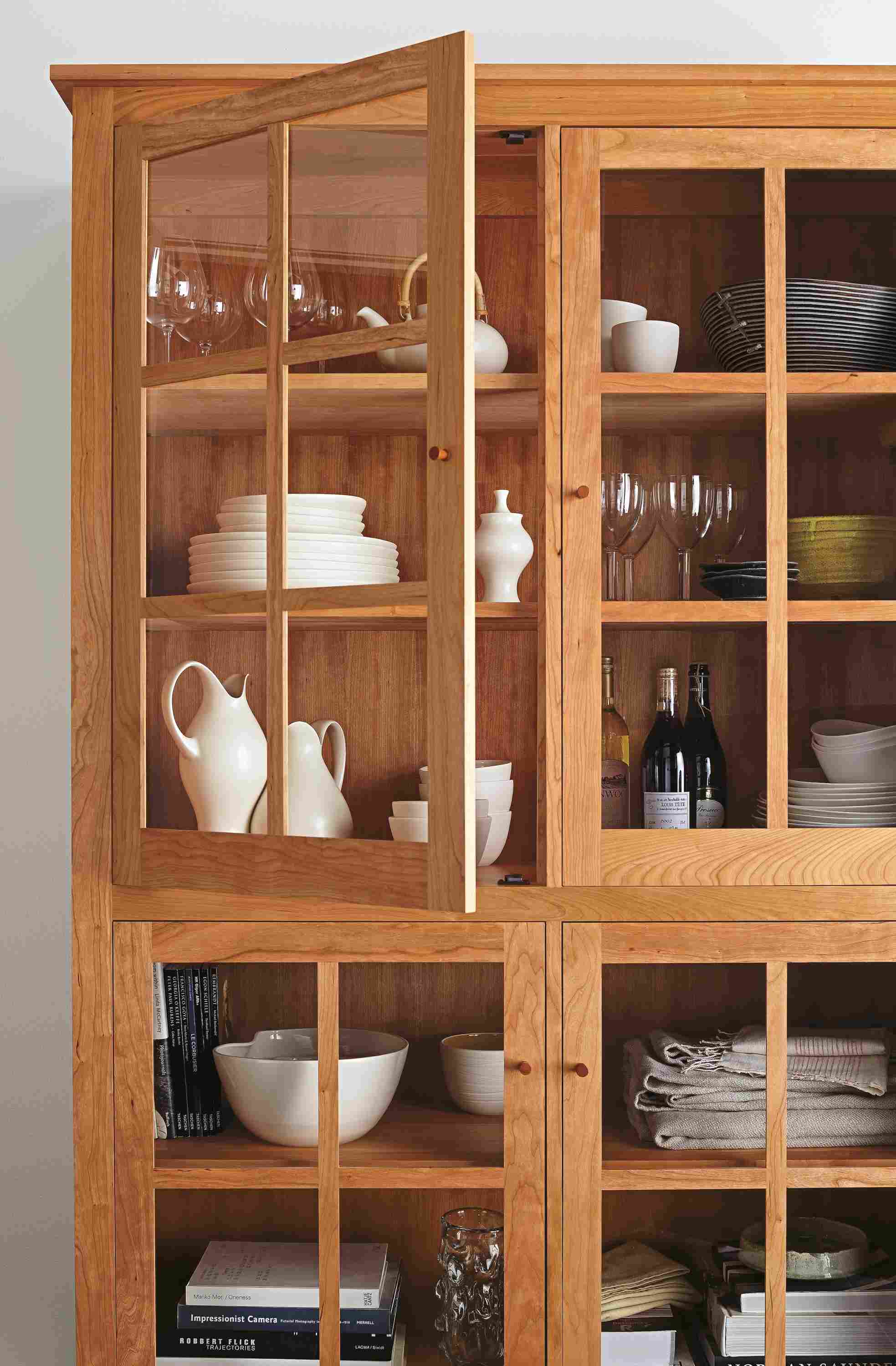 Detail of Adams 50-wide glass door storage cabinet in Cherry.