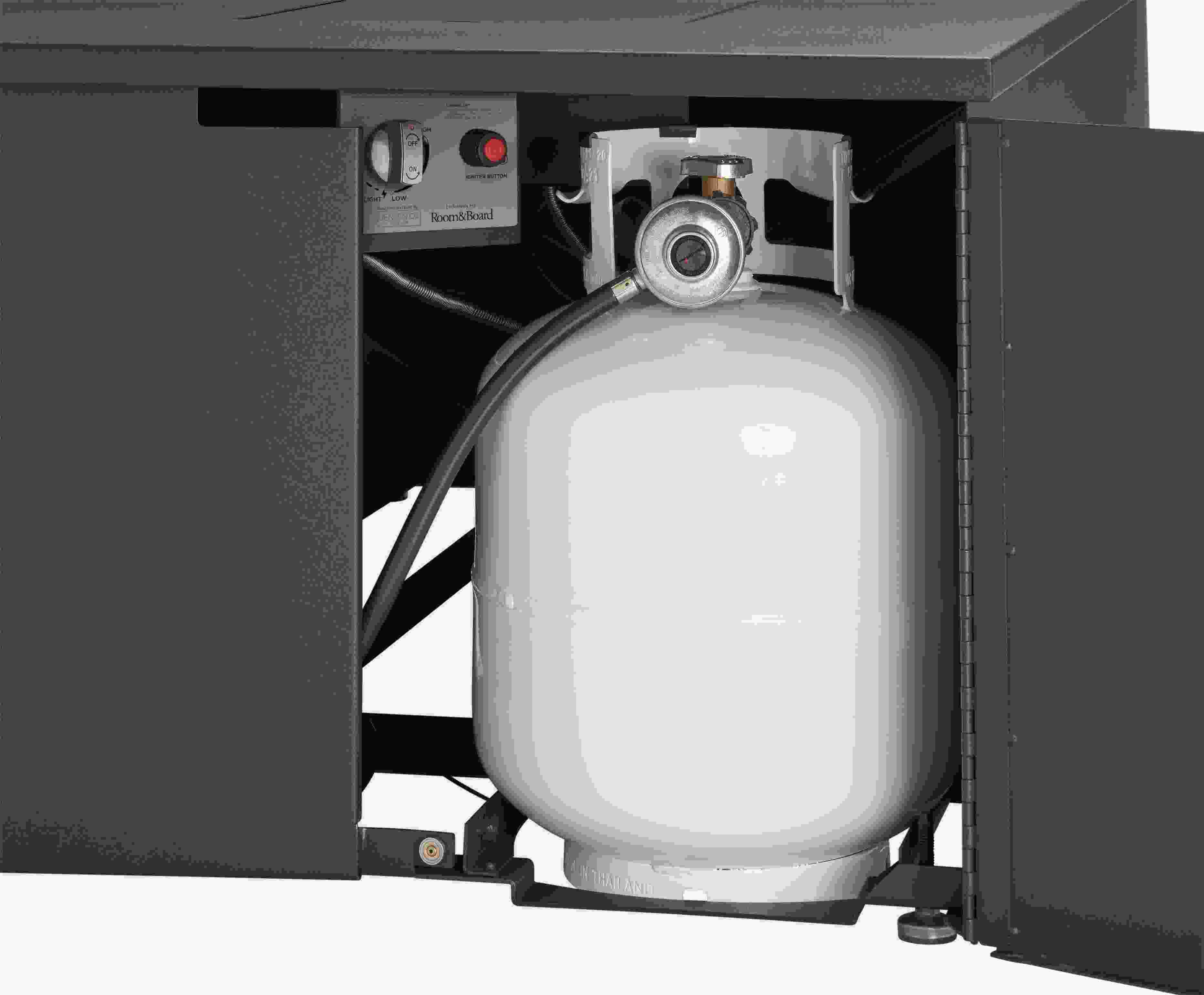 detail of propane tank inside adara fire table in graphite.