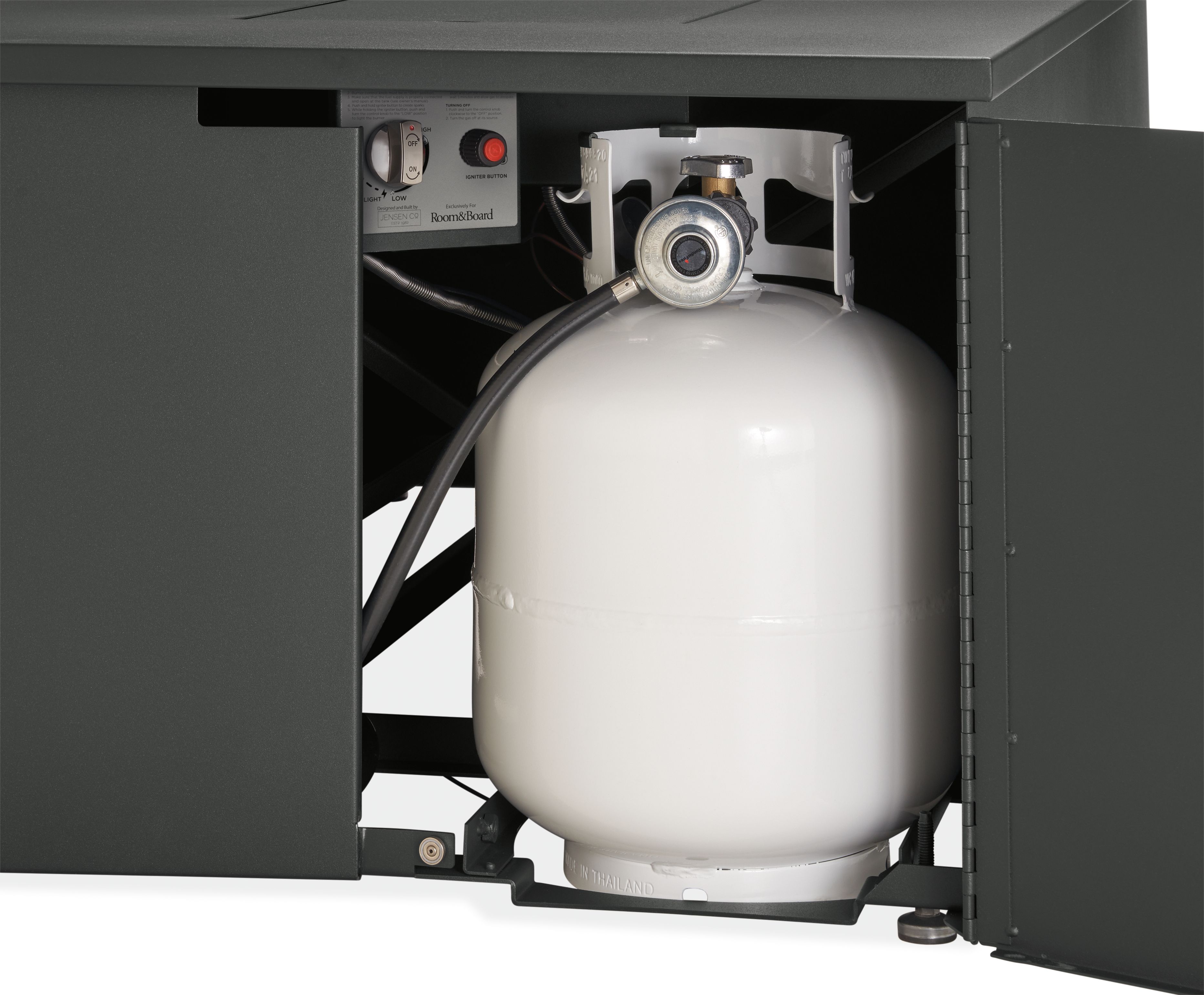 detail of propane tank inside adara fire table in graphite.