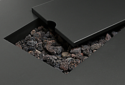 detail of cover and stone on top of adara outdoor fire table in graphite.