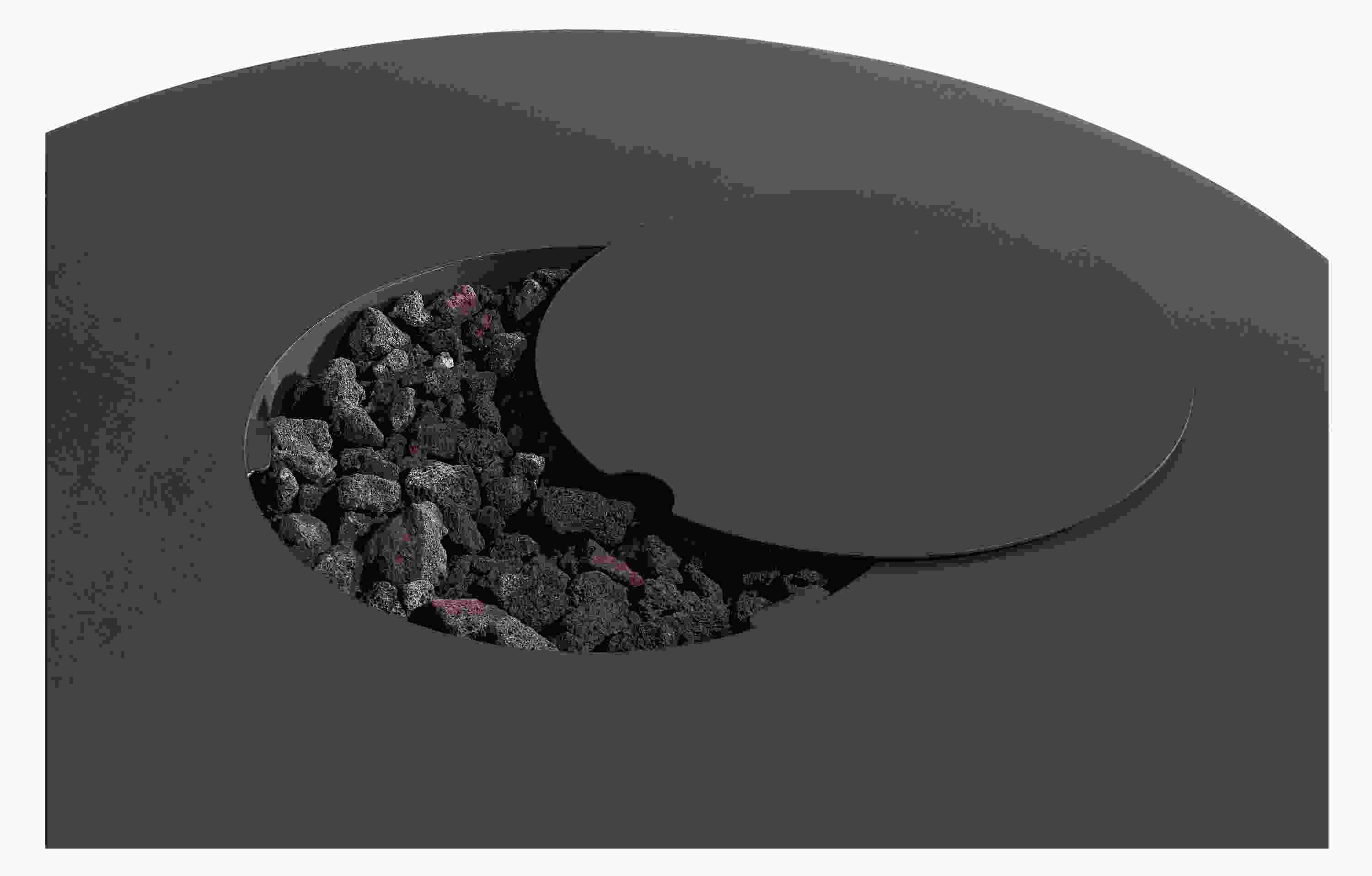 Detail of Adara 42-round Outdoor Fire Table lava rocks and lid.