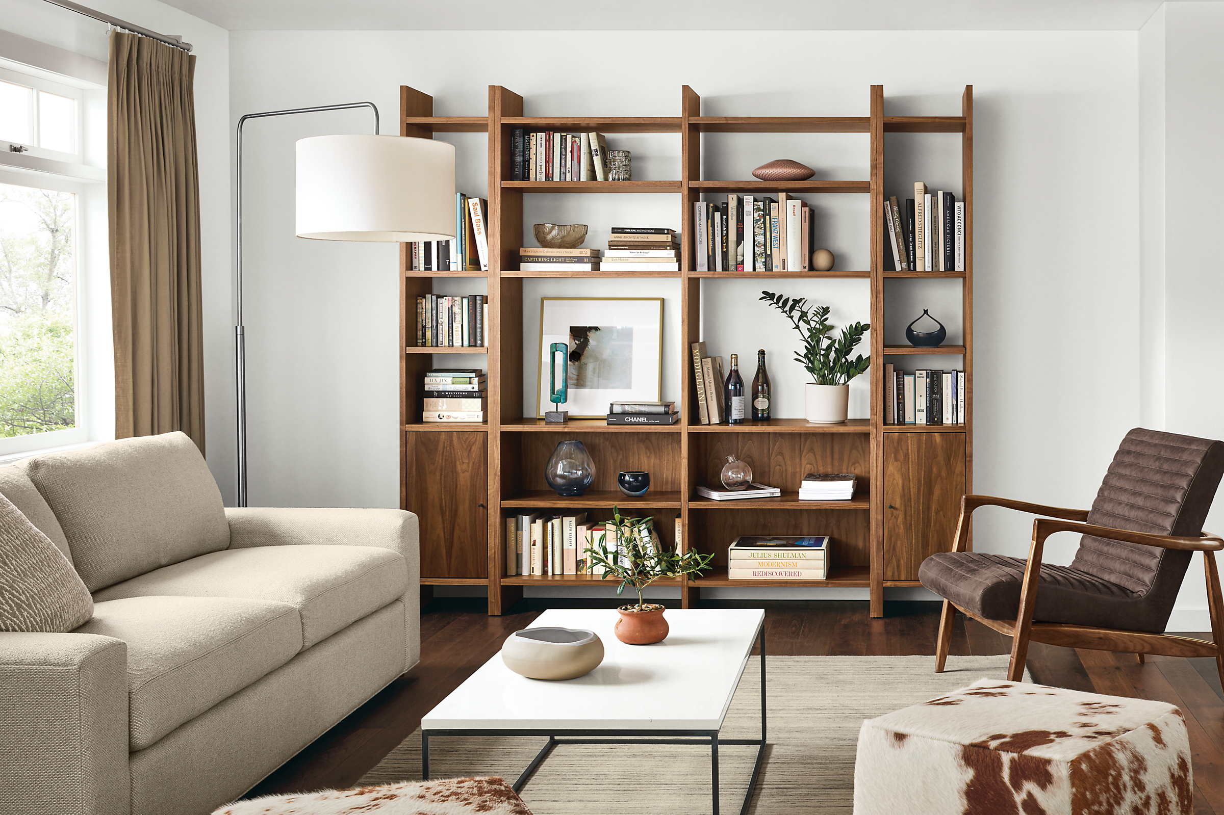 Custom Addison bookcases in warm modern living room.