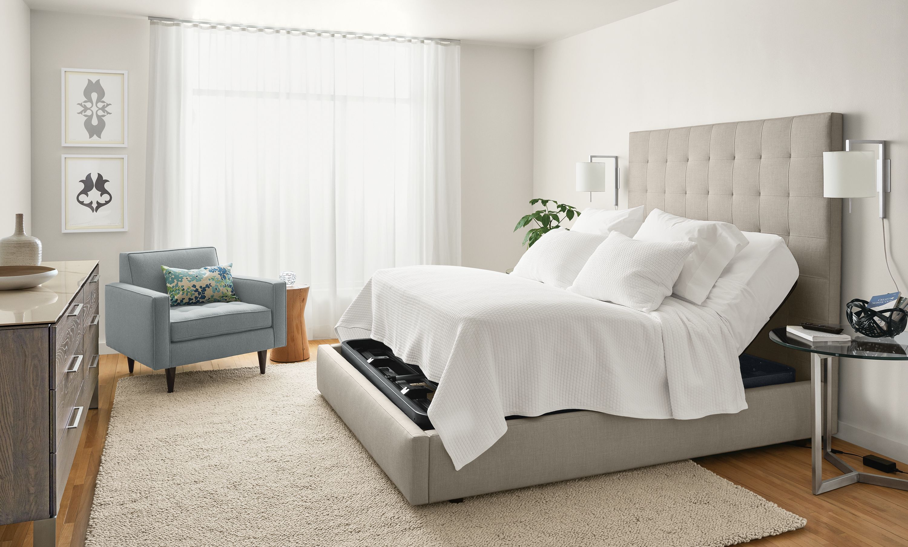 Bedroom with Room & Board queen deluxe adjustable mattress base and Whitmore coverlet in white.