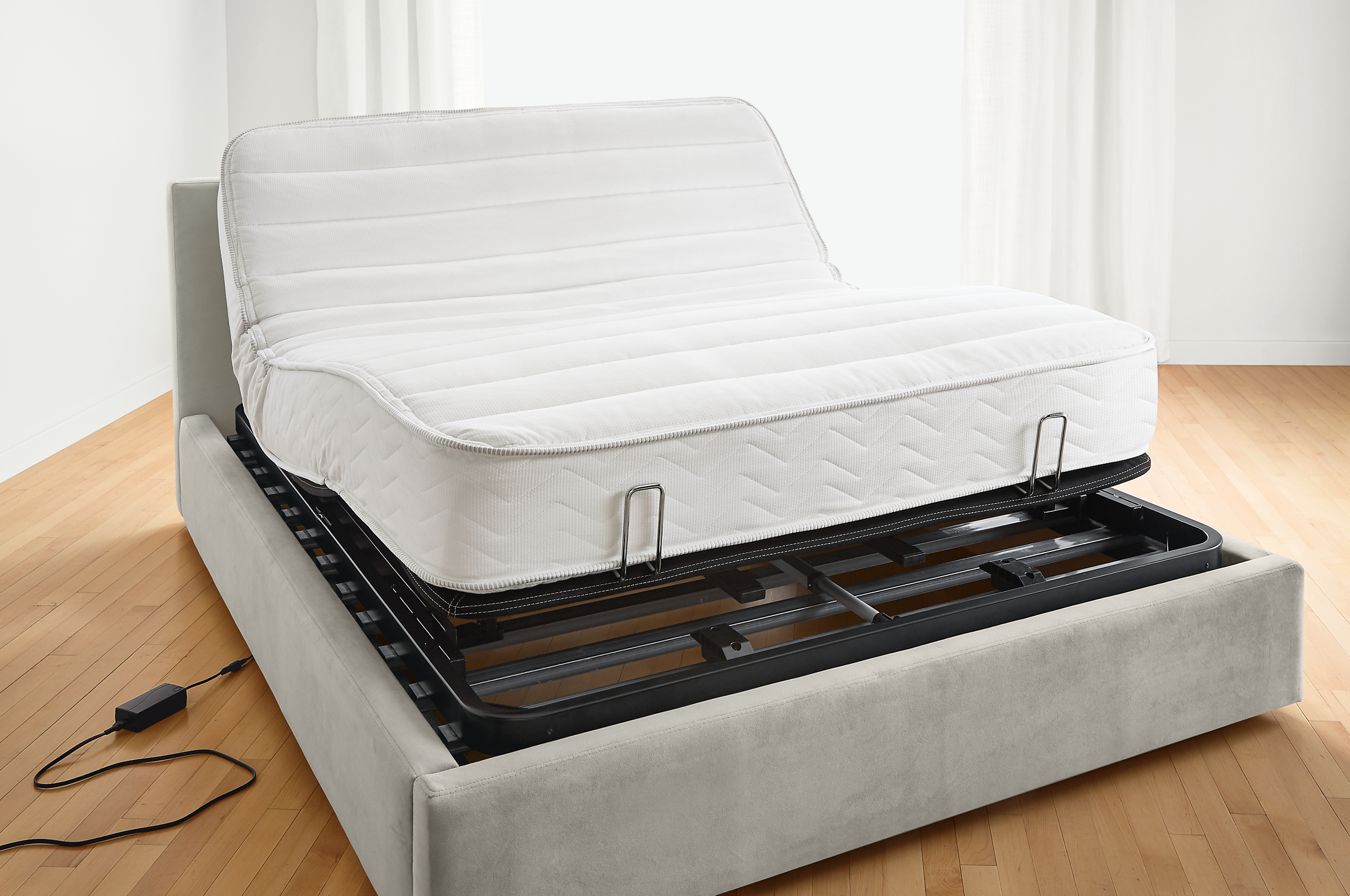 Detail of adjustable bed base with mattress.
