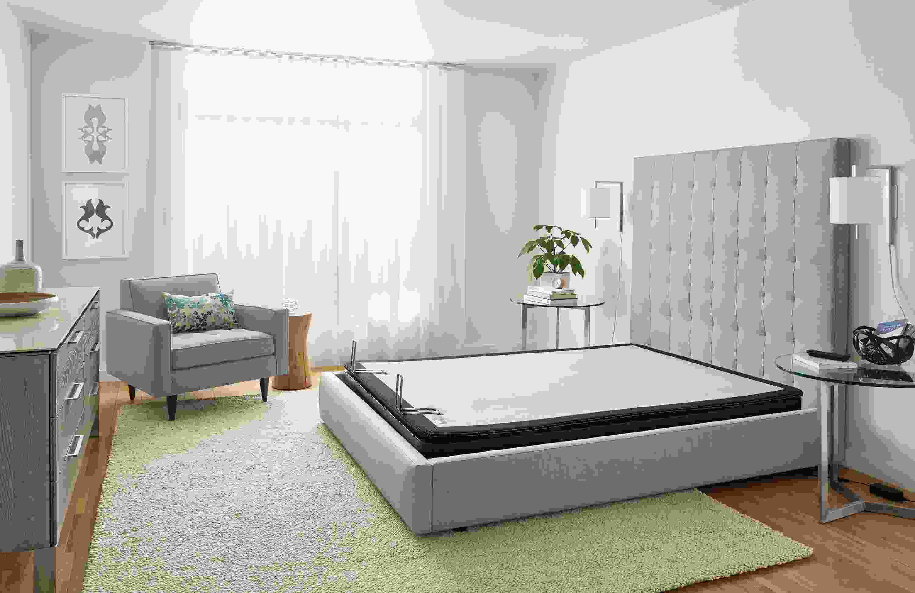 Large bedroom with detail of Room & Board queen deluxe adjustable mattress base  shown without mattress.