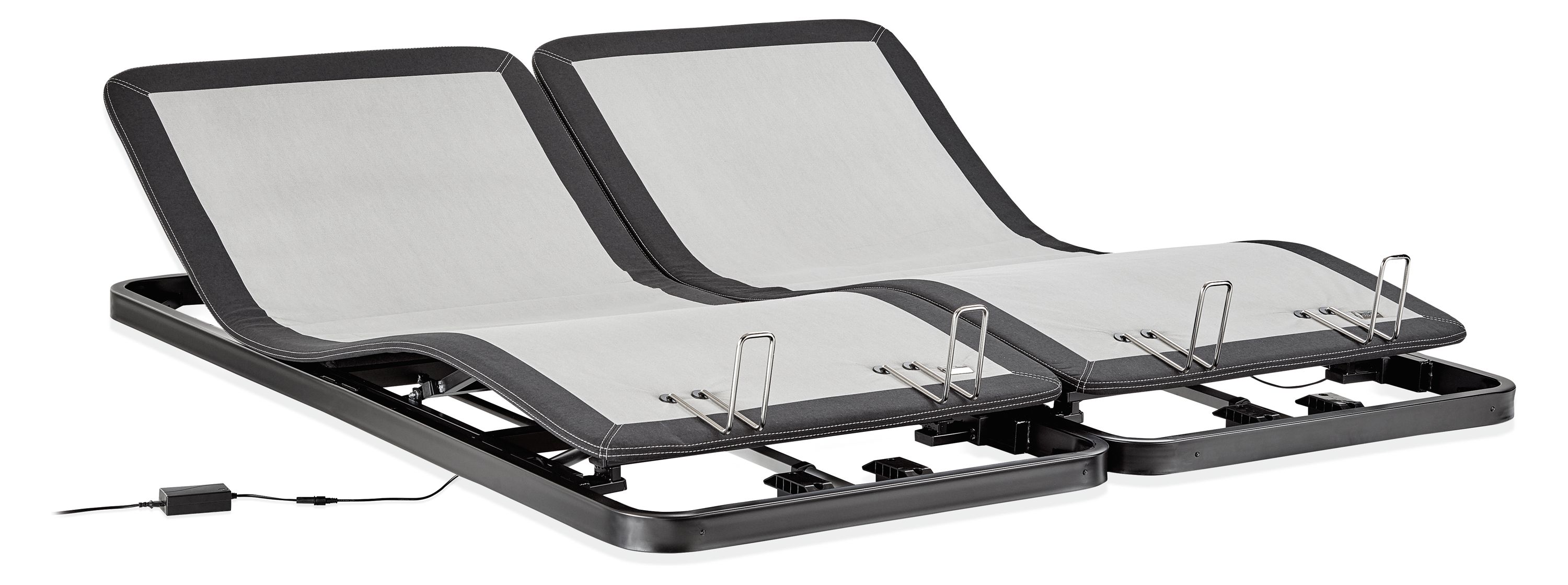 Detail of two split-king adjustable bed bases slightly raised.