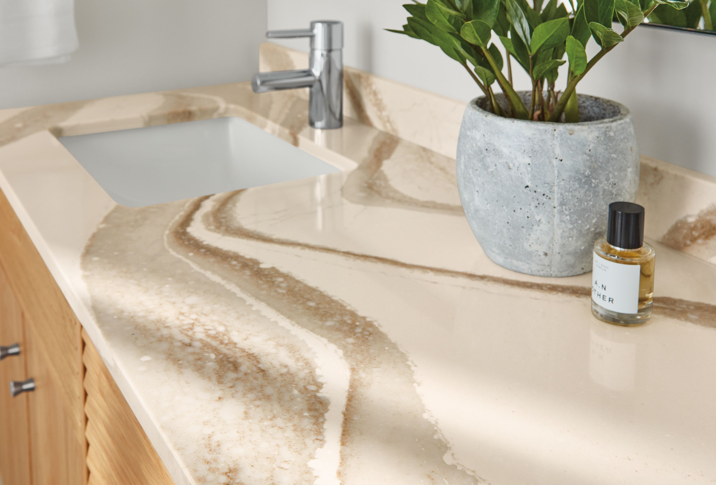 Close-up of Adrian vanity with Cambria Brittanicca Gold Warm top.