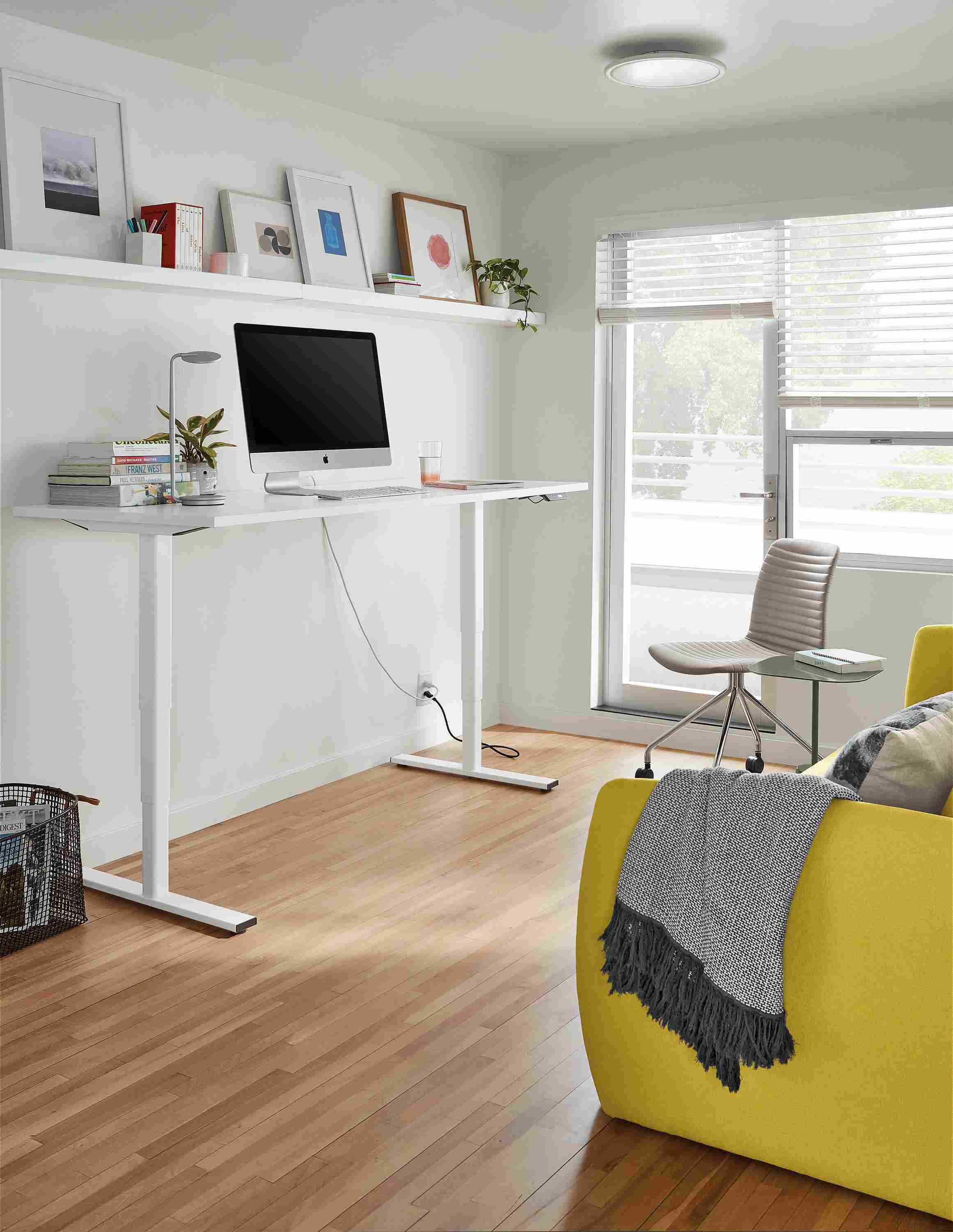 Aedric 72-wide Adjustable Standing Desk in standing position in white.