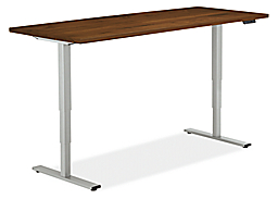 Detail of Aedric 72w 30d 23-49h Adjustable Standing Desk in Silver with Walnut top in standing position.