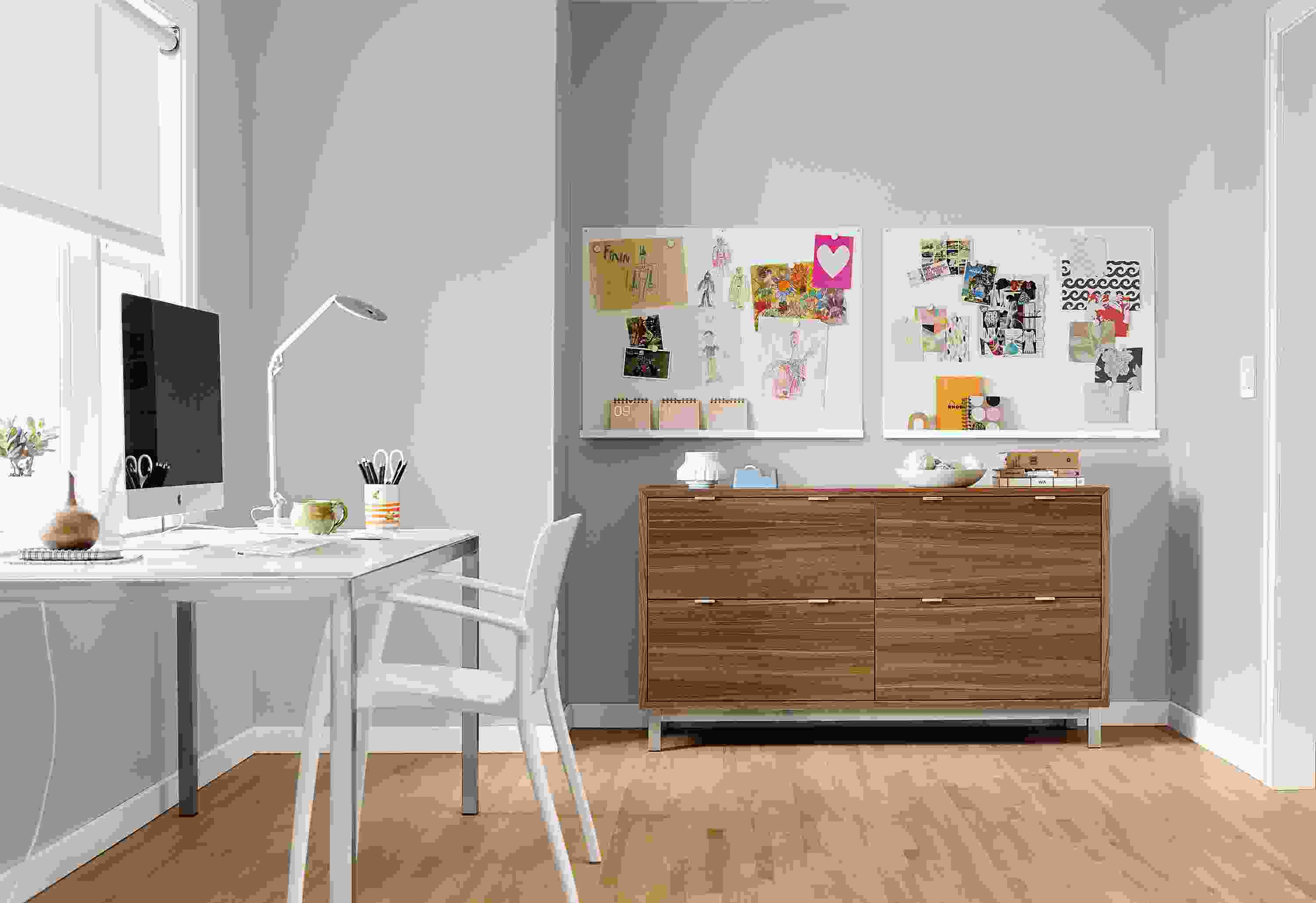 Home office with detail of 2 Agenda magnetic boards in white.