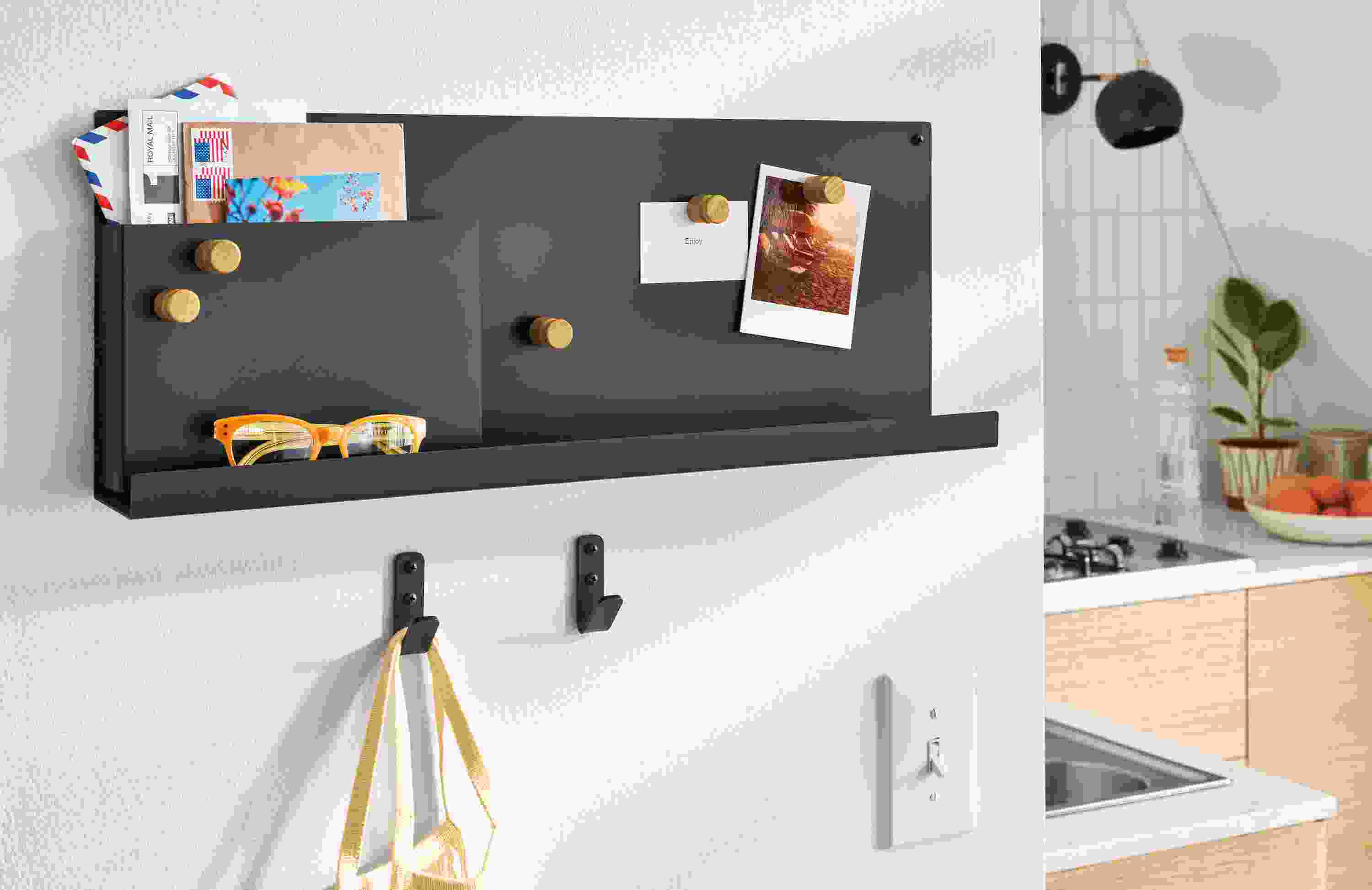 Kitchen with Agenda magnetic board in graphite and Crew wall hooks in graphite.