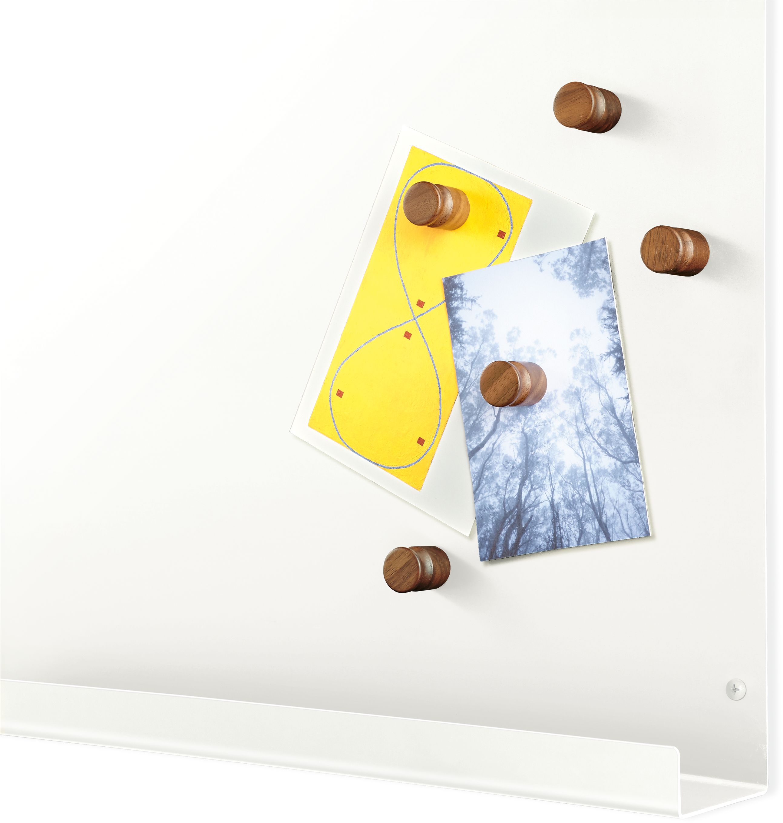 Corner detail of Agenda magnet board in white.