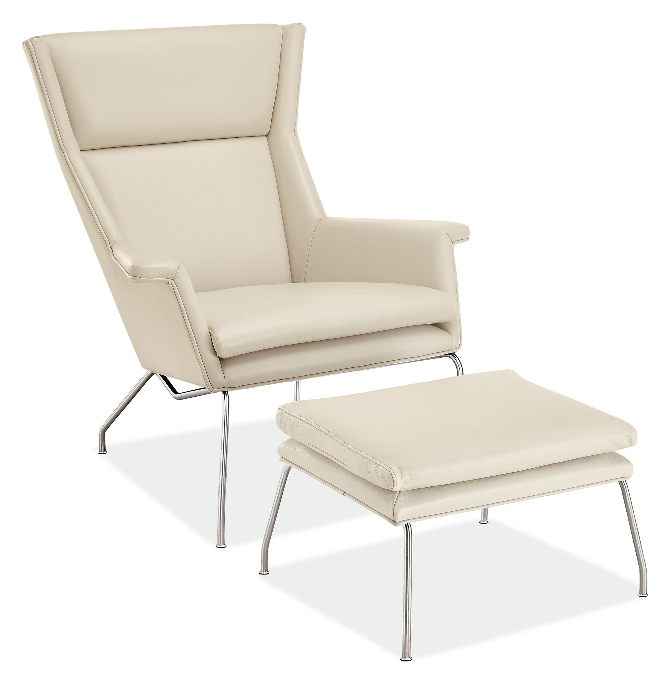 Angle  view of Aidan Chair and Ottoman in Urbino Leather with Stainless Steel base.