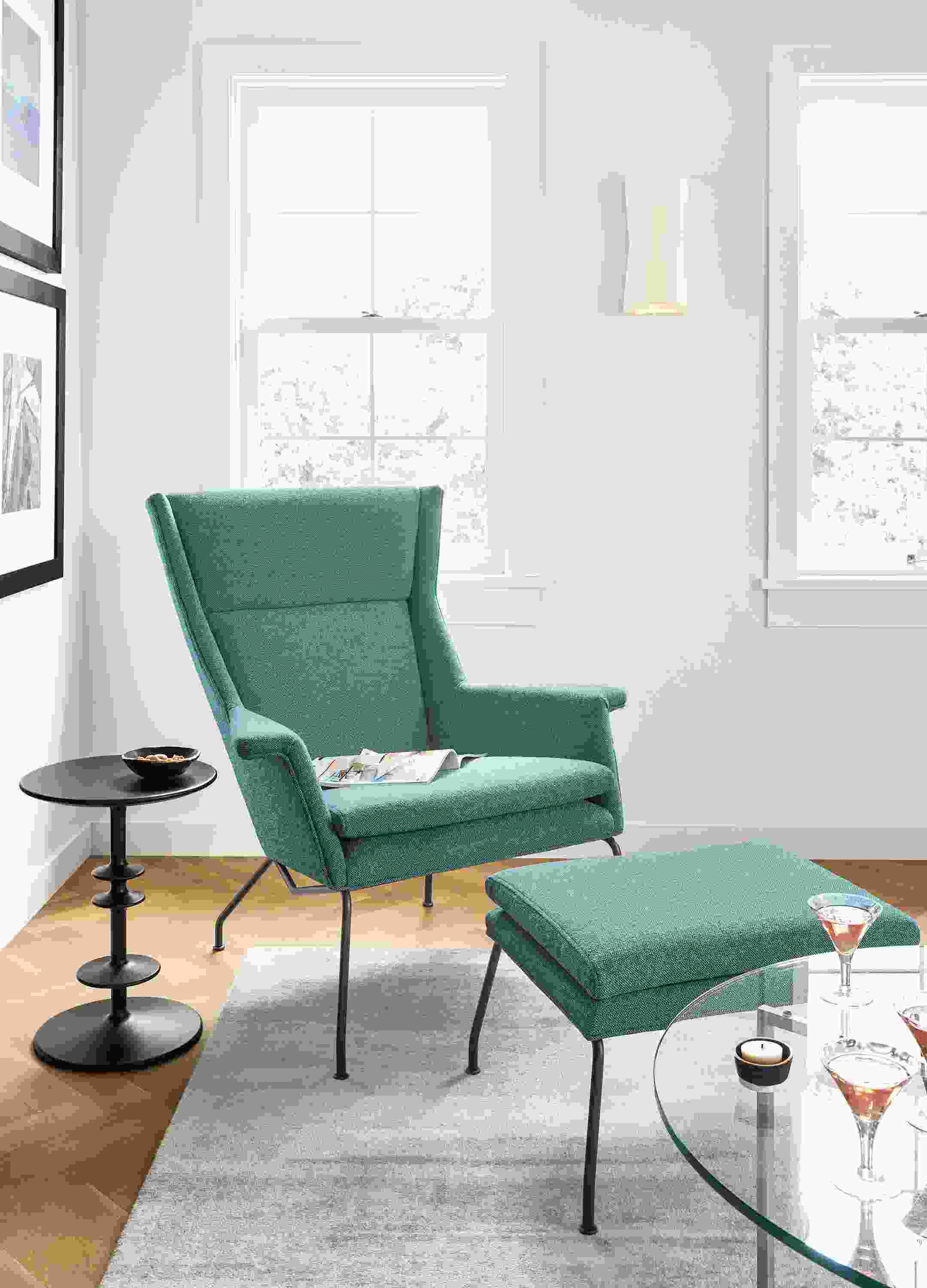 Detail of Aidan chair in Tatum Teal fabric with ottoman.