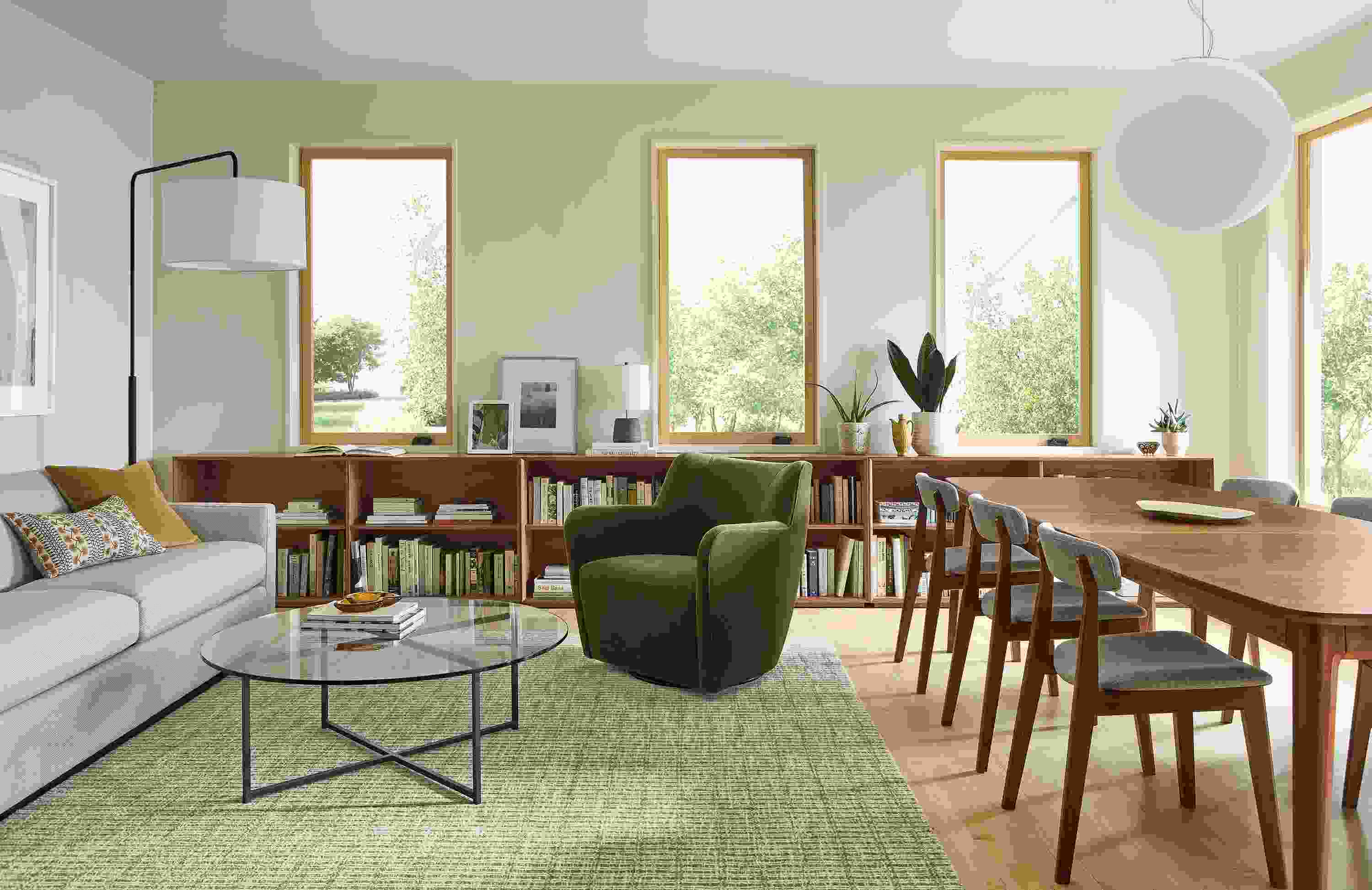 A great room with 94-wide Alex sofa in Derry Natural, Walcott extension table in walnut and Nera rug in Stone.