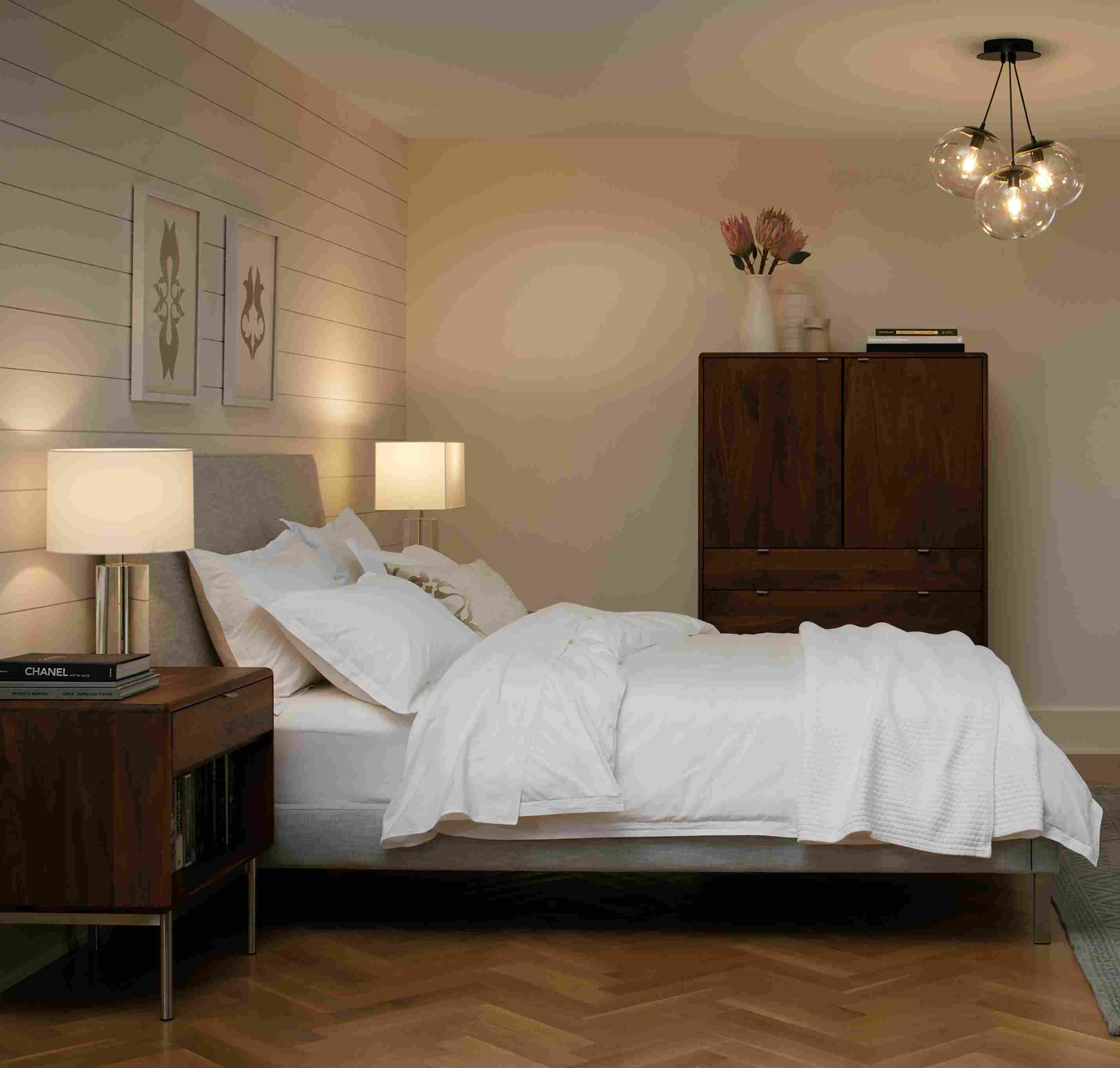 Bedroom with Humboldt 3-globe chandelier in clear glass and Ella queen bed in Destin Grey.