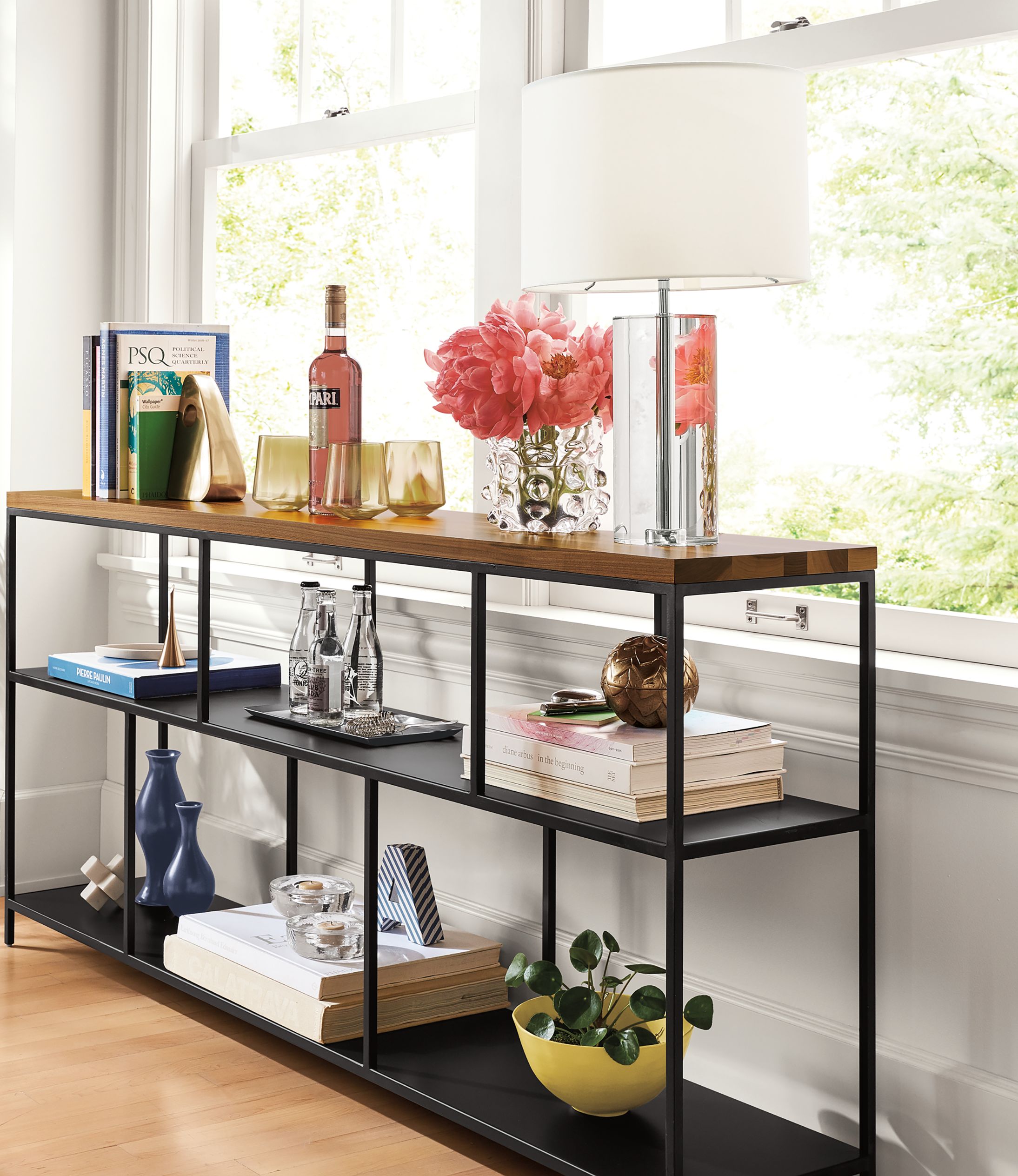 Side detail of Bowen console table near window.