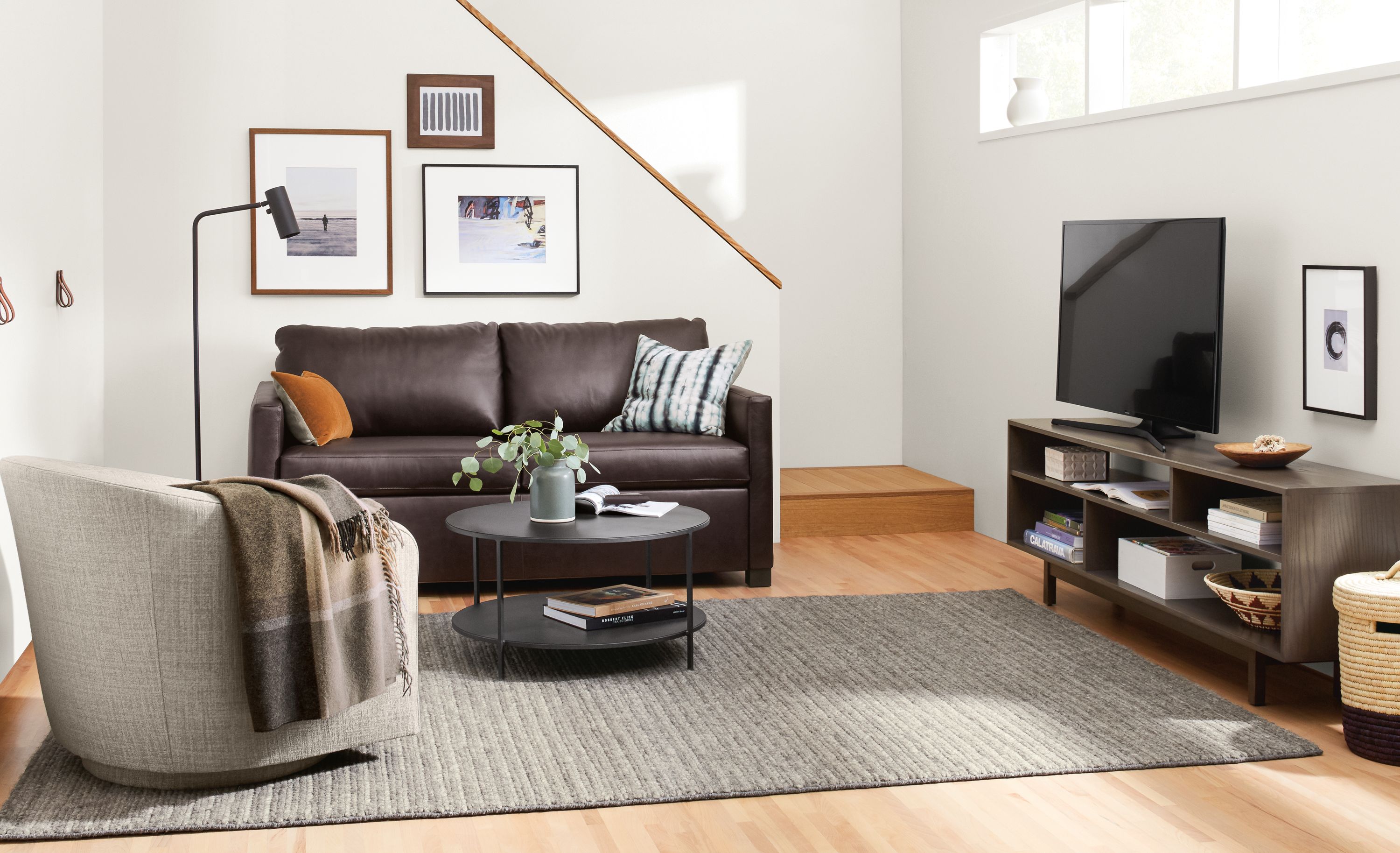 Closed view of leather Allston sleeper sofa.