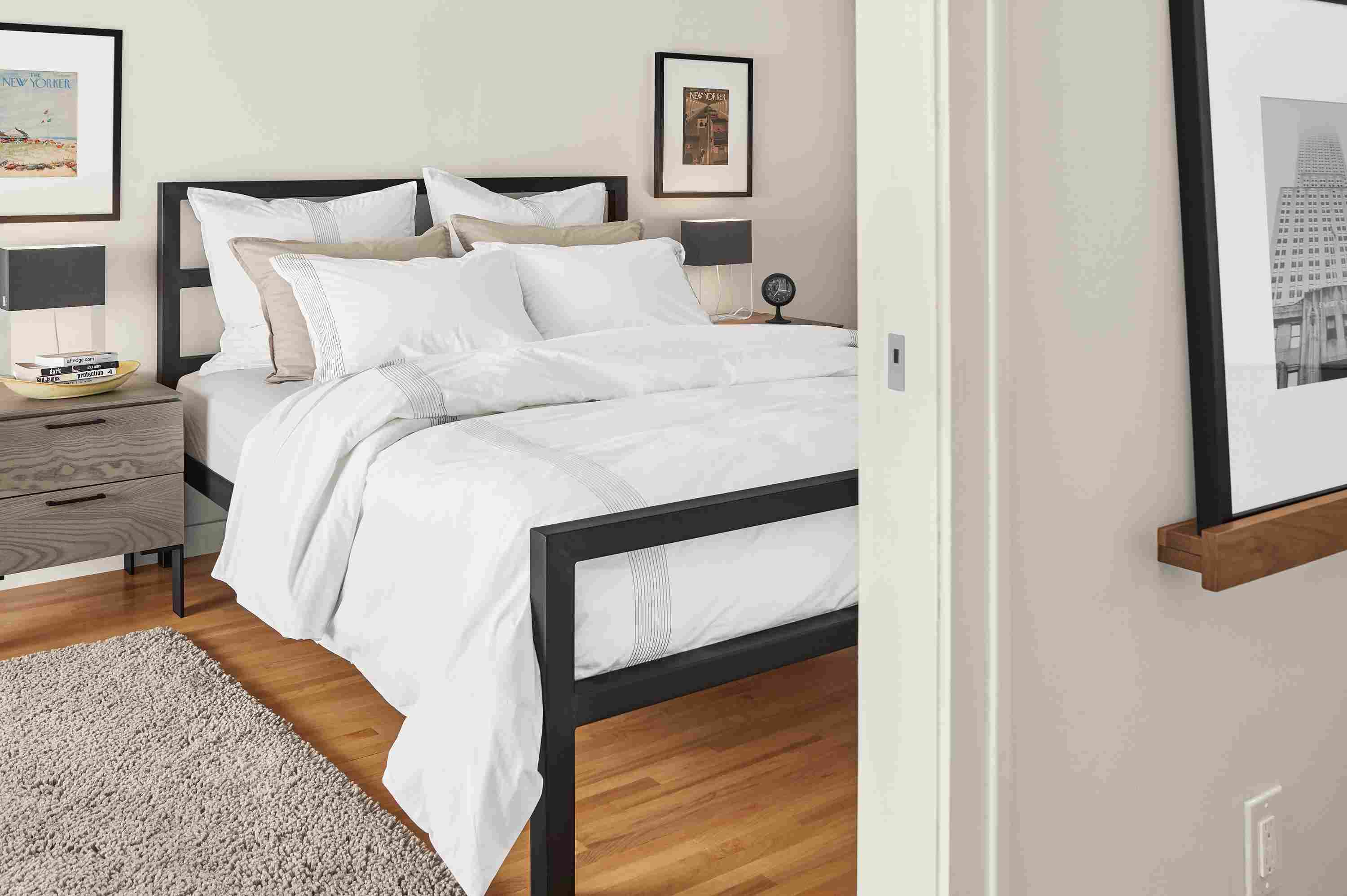 Cozy bedroom with Ambler duvet cover and percale shams in white on a Parsons Queen bed.