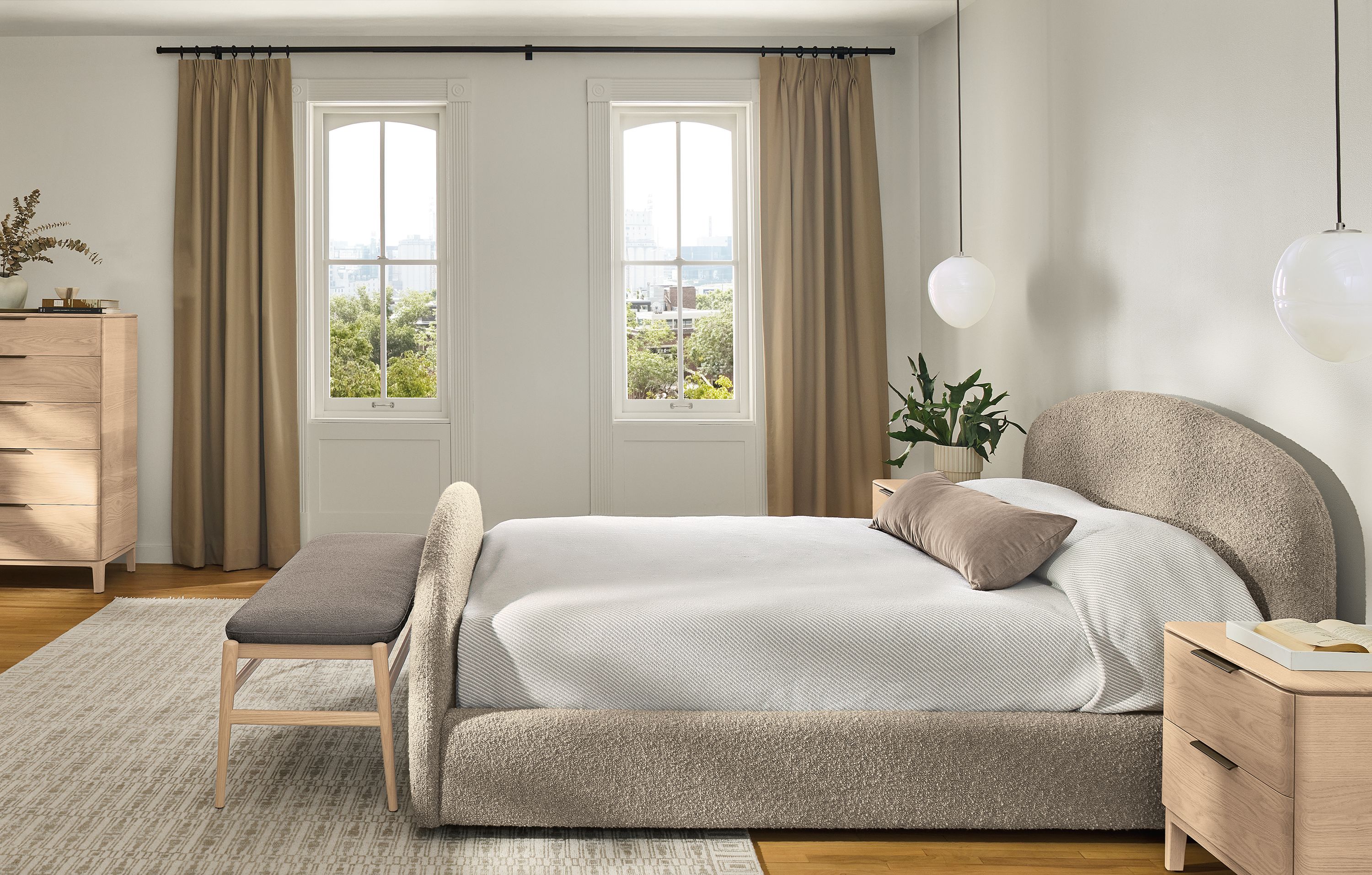 Bedroom with Amelia Queen low bed in Dornick Otter and Kingston nightstands and dresser in salt on red oak.