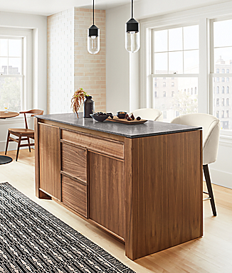 Amherst 60-wide Kitchen Island in walnut with Cora Swivel Counter Stool in Sumner Ivory and Ballad Pendants.
