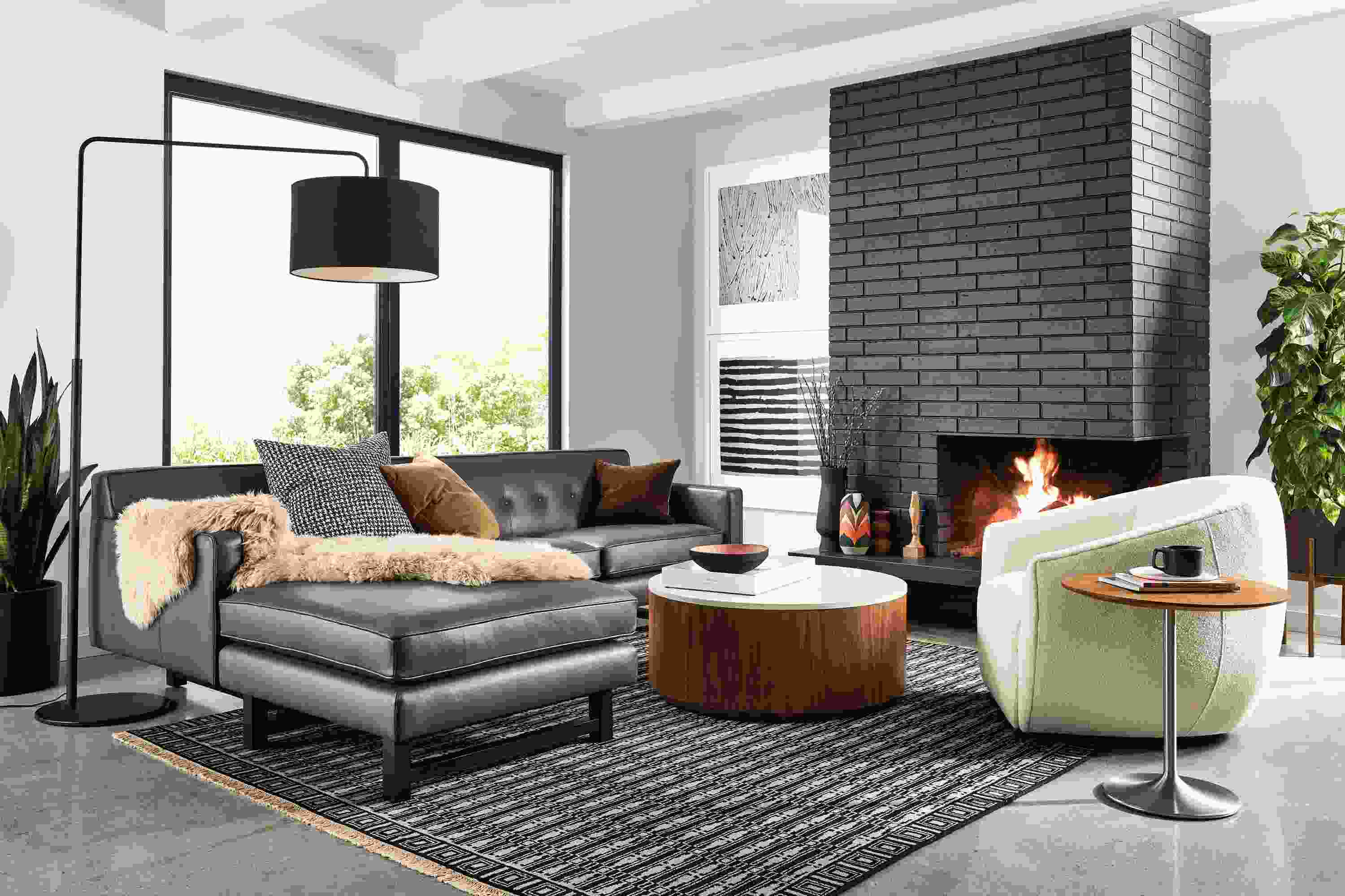 Andre Sofa with Left-Arm Chaise in Urbino Smoke with Mora Swivel Chair and Liam coffee table.