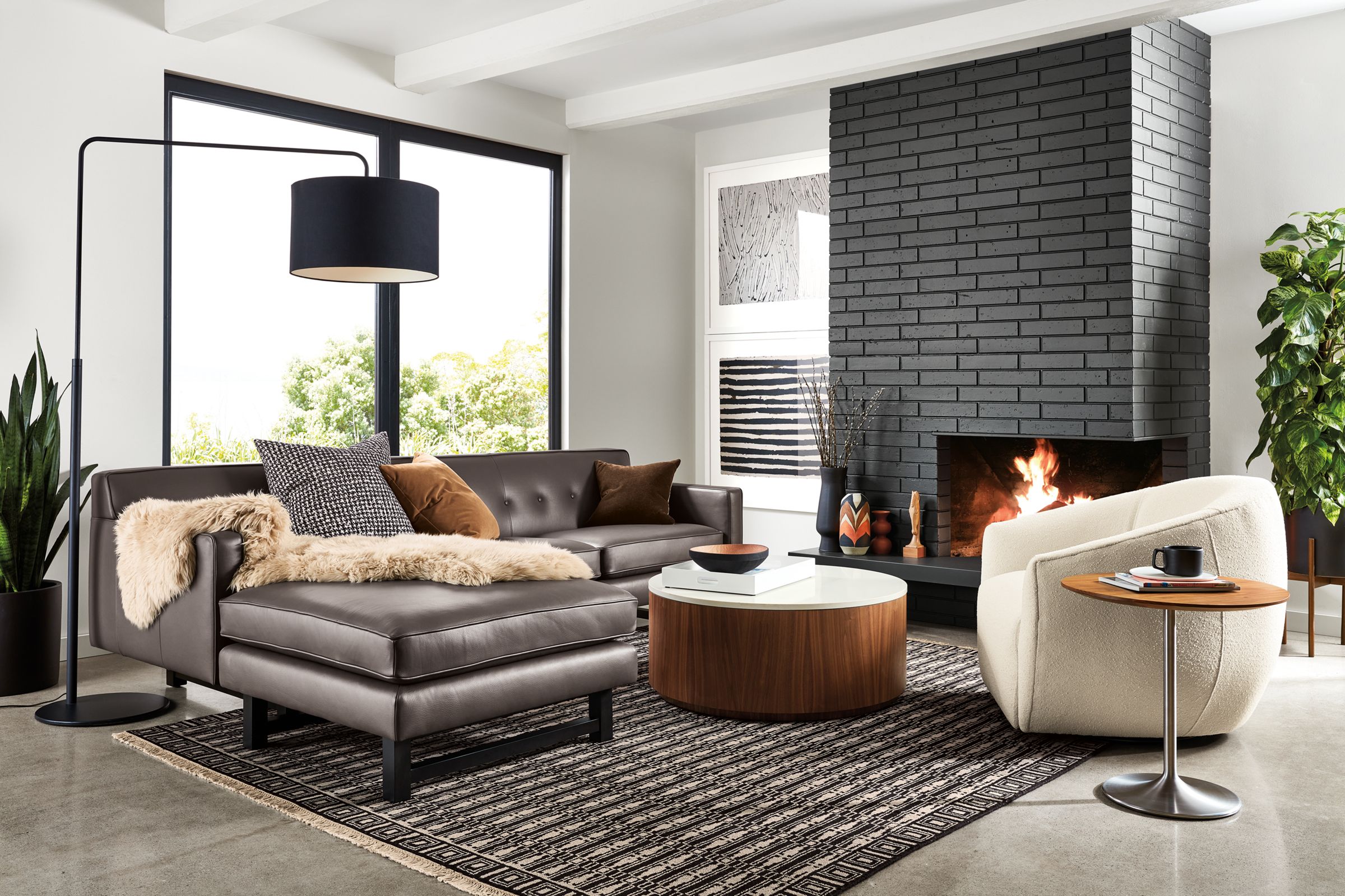 Andre Sofa with Left-Arm Chaise in Urbino Smoke with Mora Swivel Chair and Liam coffee table.