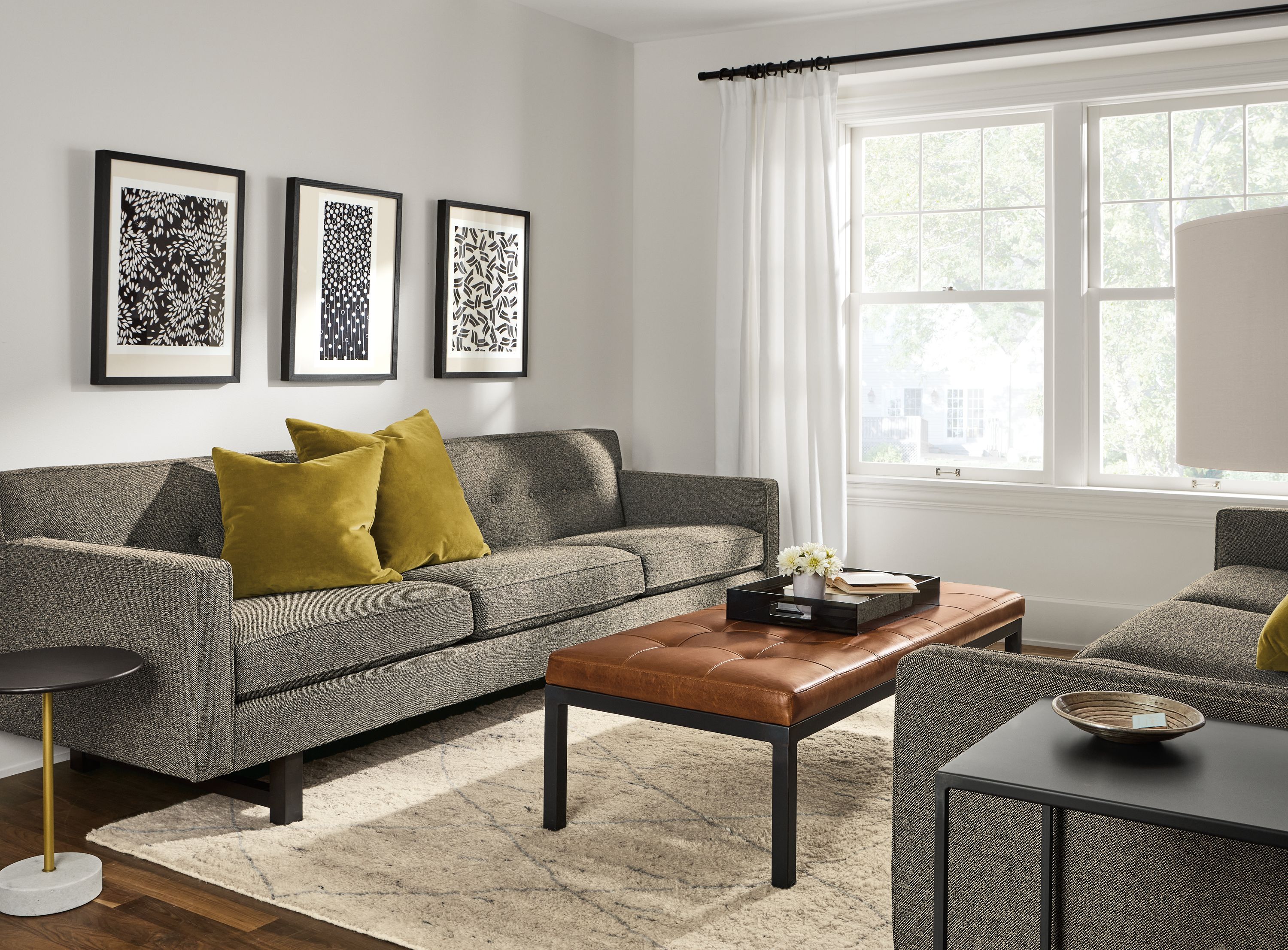 living room with two andre sofas in tatum salt and ravella bench in vento cognac.