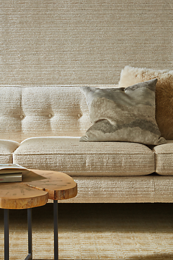 Detail of Andre sofa in Brinley Natural fabric in living room.