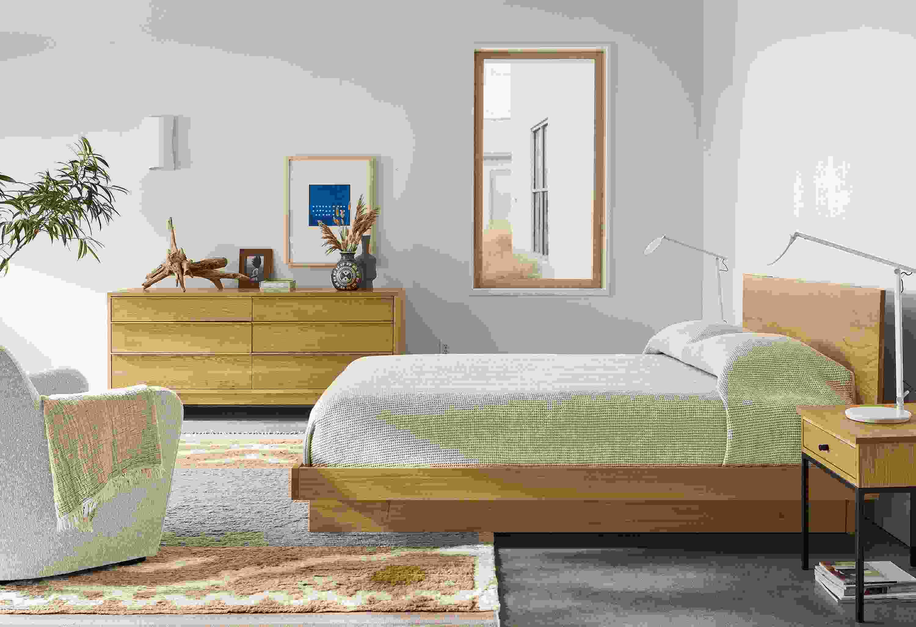 Bedroom with Anton bed and dresser in white oak, Tova rug, Lily chair.