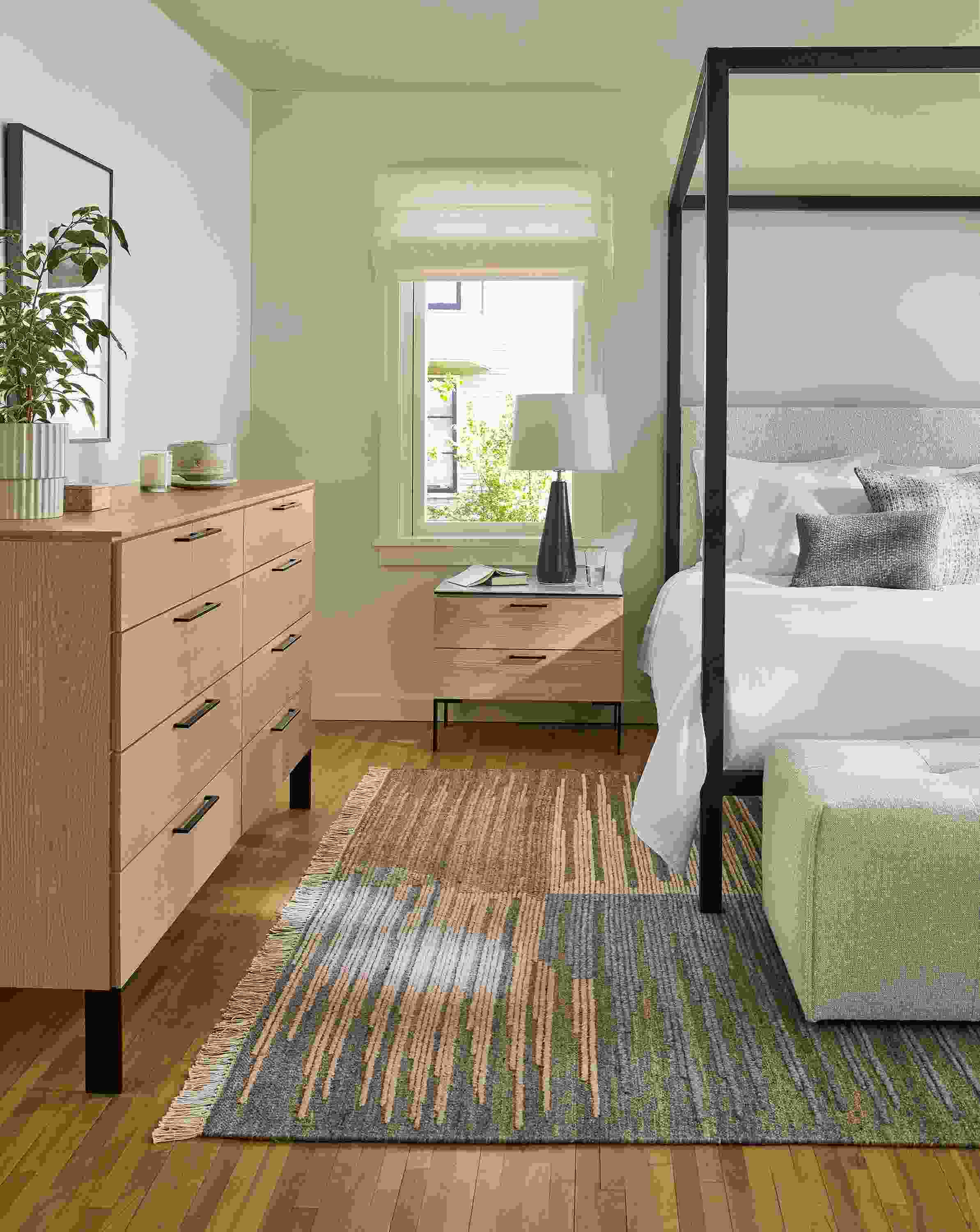 Bedroom with Architecture queen bed in conley natural and Kenwood nightstand and dresser in rye on red oak.