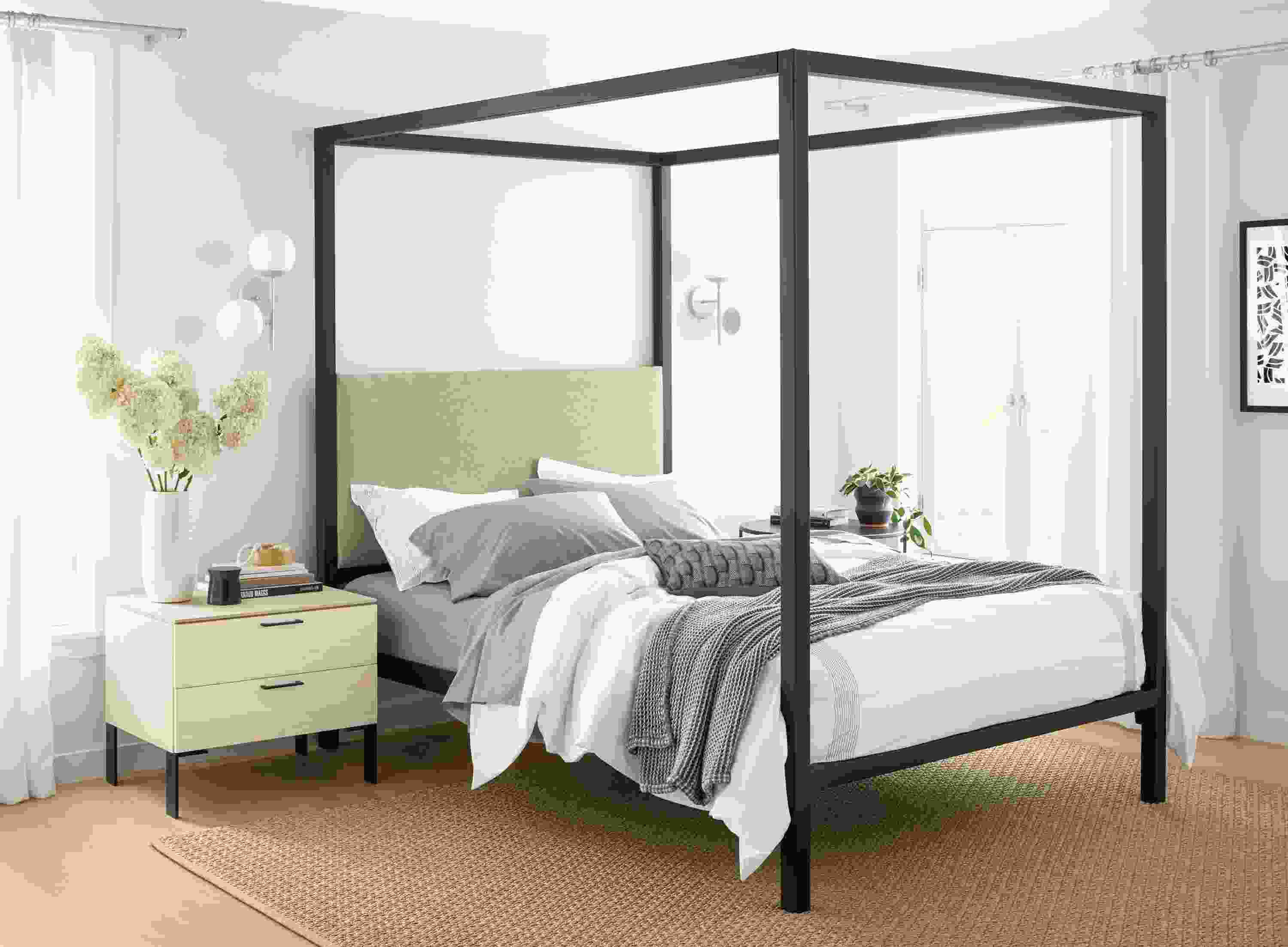 Detail of Architecture queen bed in natural steel with Tatum fabric headboard in bedroom.