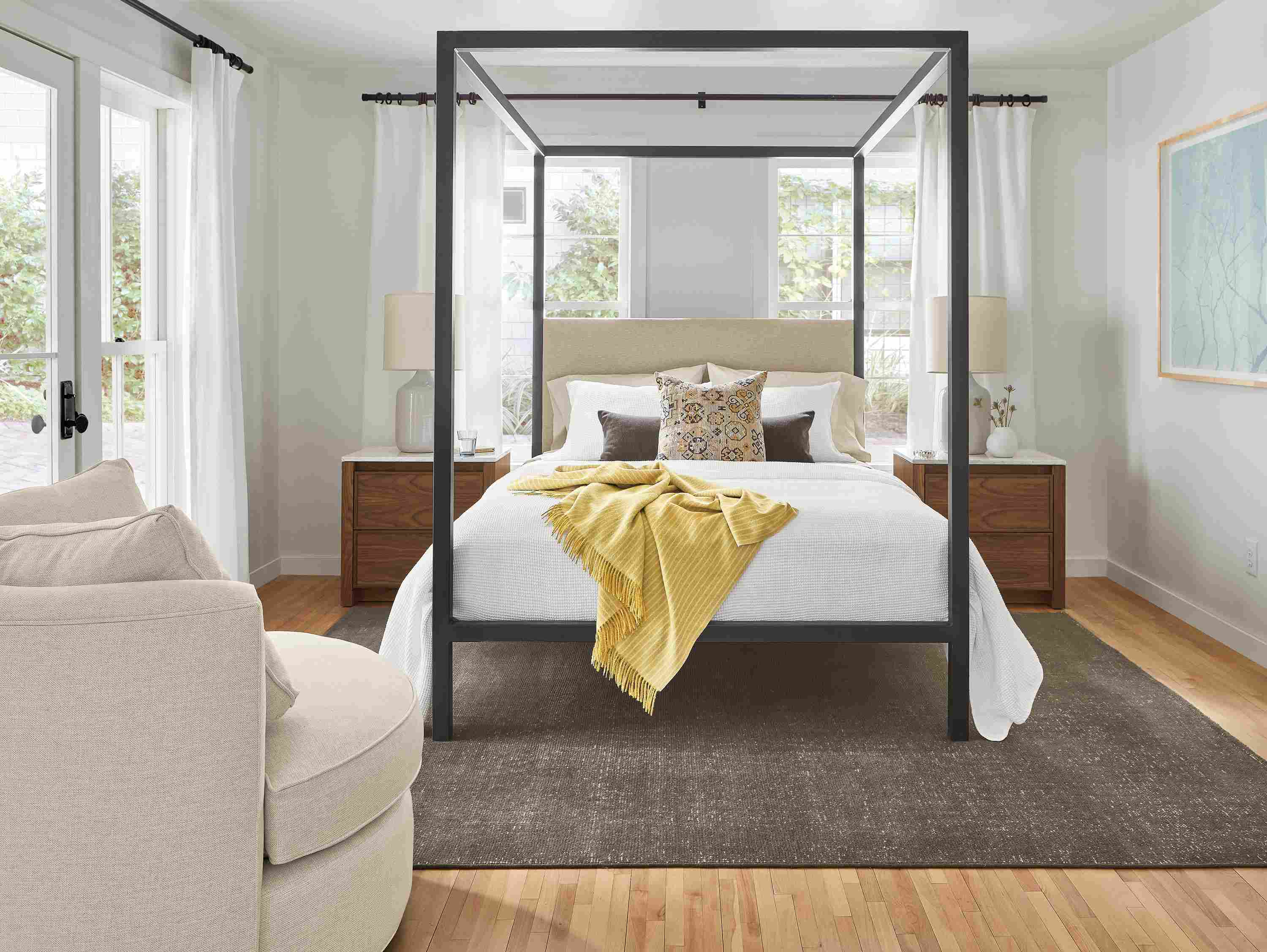 Detail of bedroom with Architecture queen bed, Amherst nightstands, Eos swivel chair.
