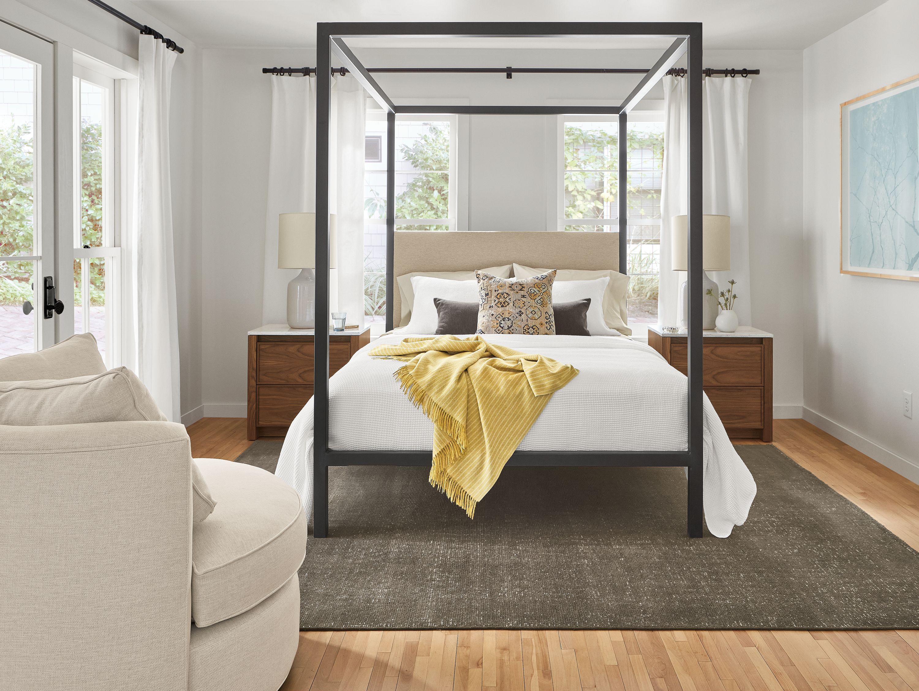 detail of bedroom with architecture queen bed, amherst nightstands, eos swivel chair.