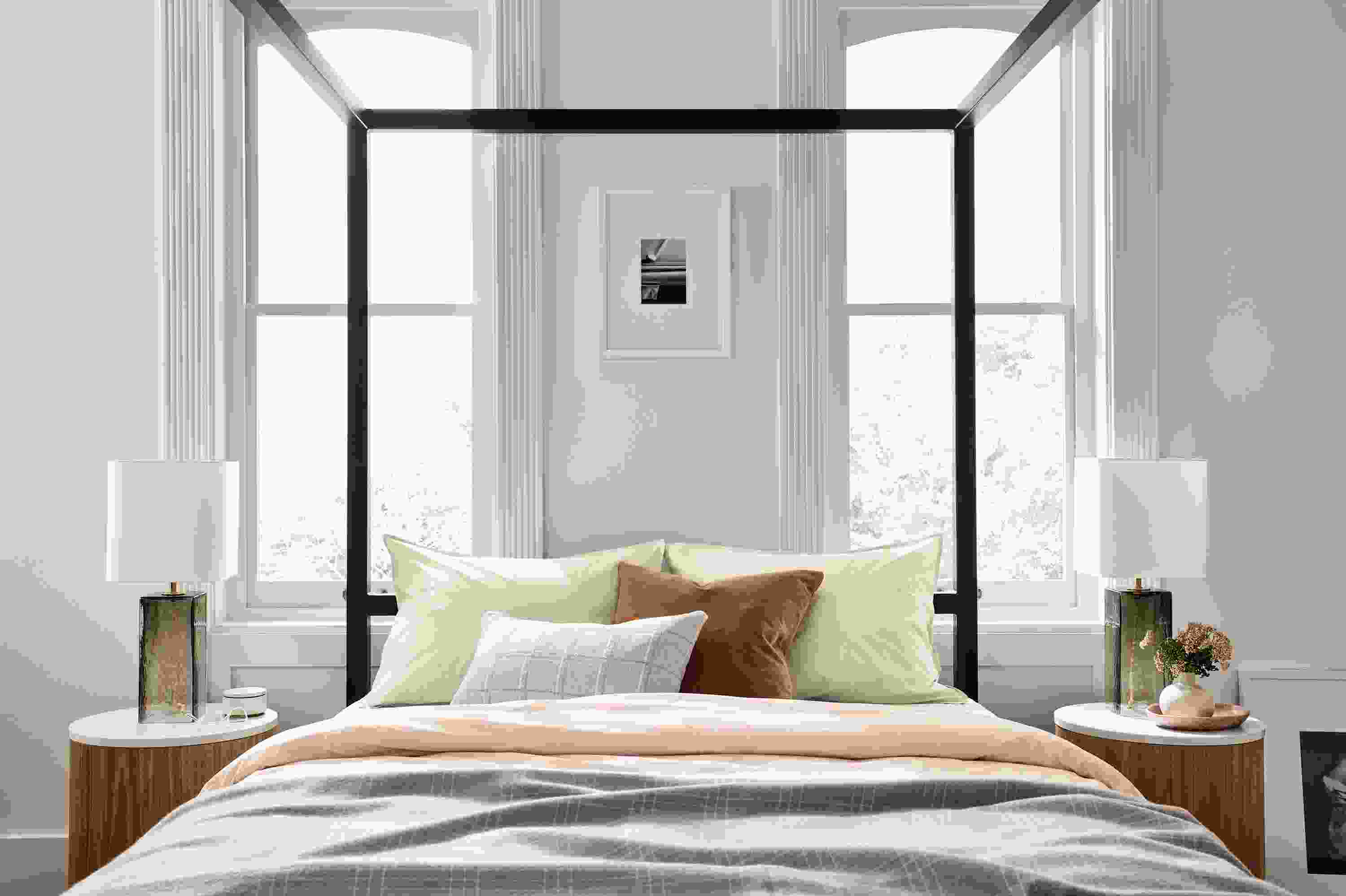 Large bedroom with Architecture Bed in natural steel with Liam 18-round end tables and Atwood lamps.