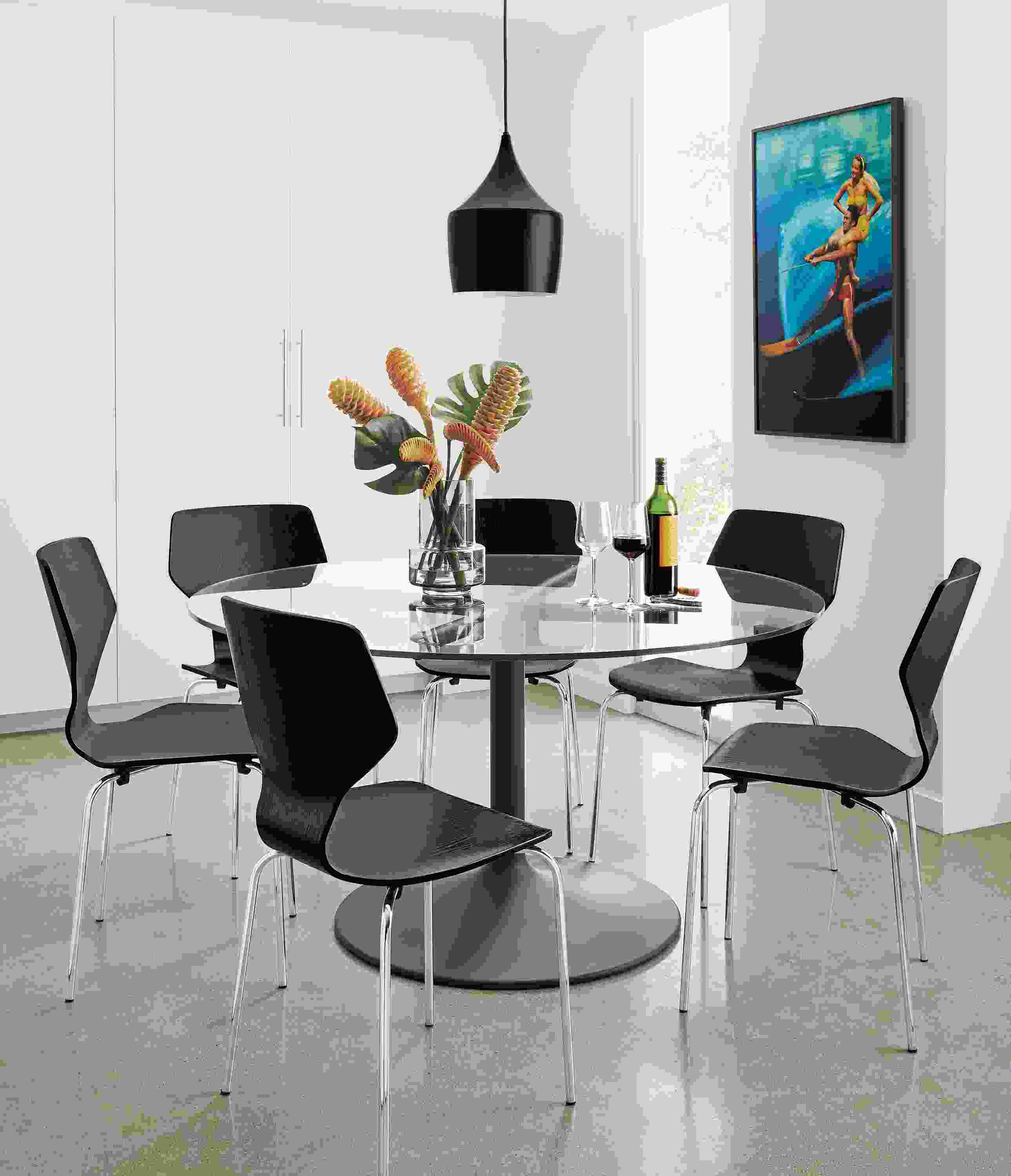 Detail of Aria round table with six chairs.