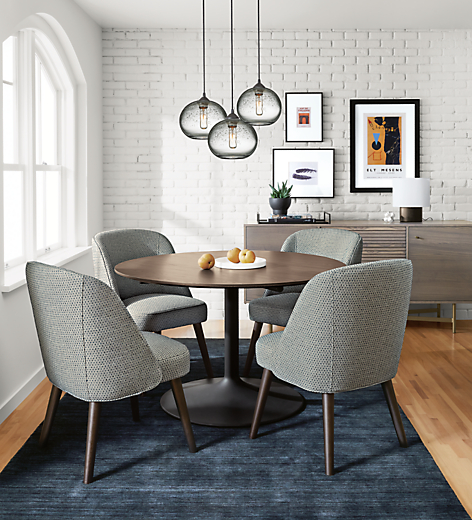 Detail of Aria table and Cora chairs in dining room.