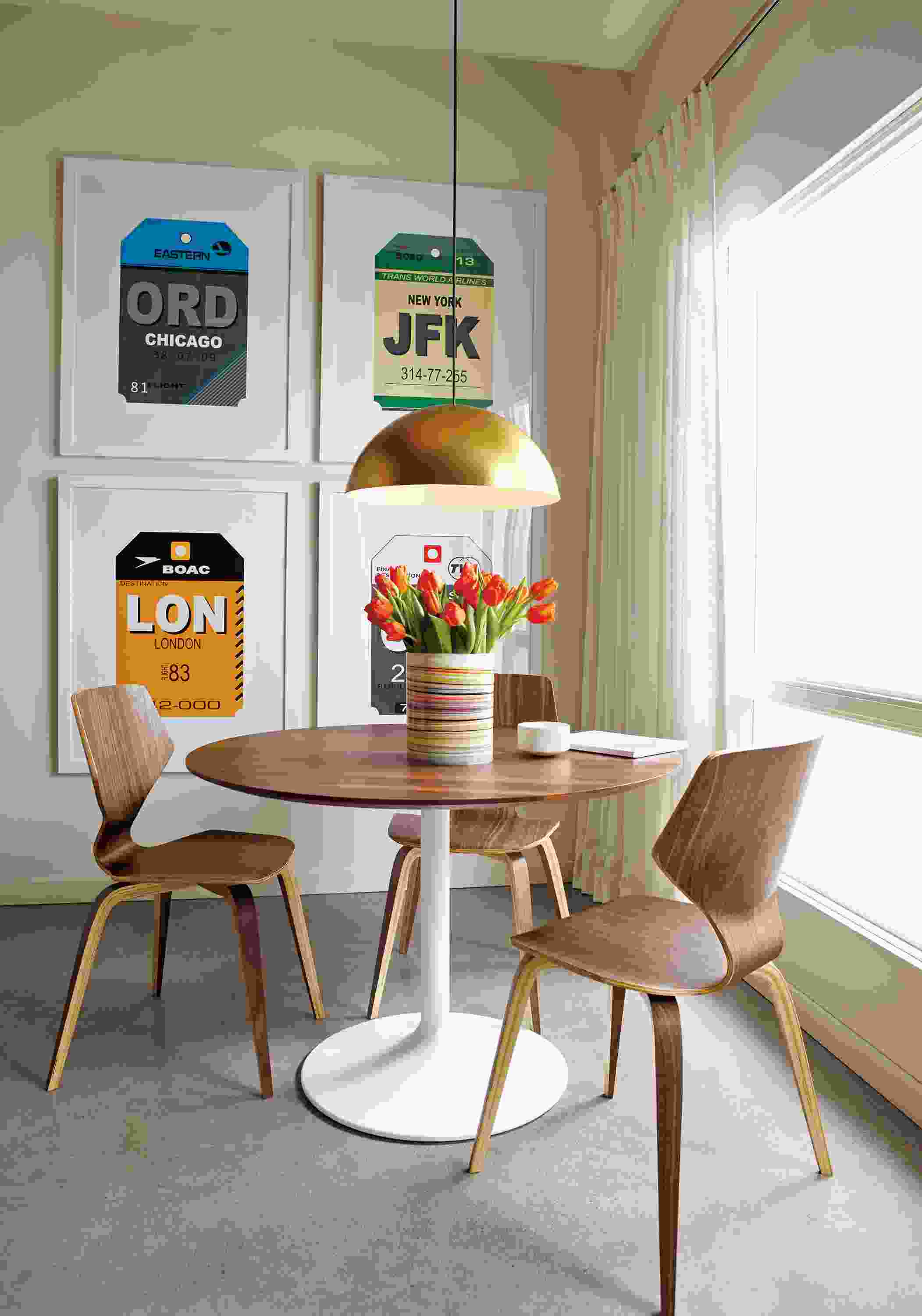 Detail of Aria round table with wood top.