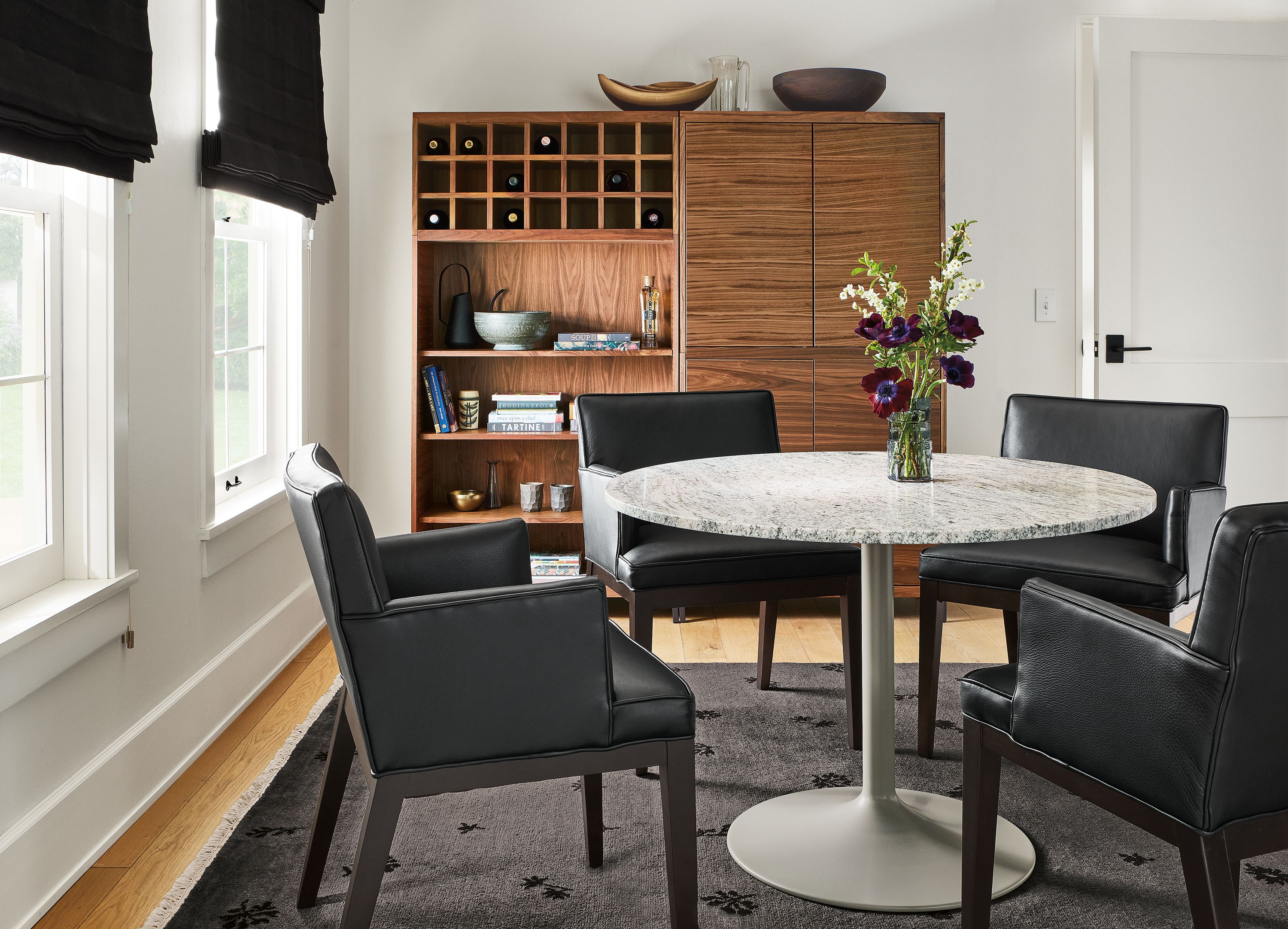 Decker Oval Tulip Dining Table with Black Base