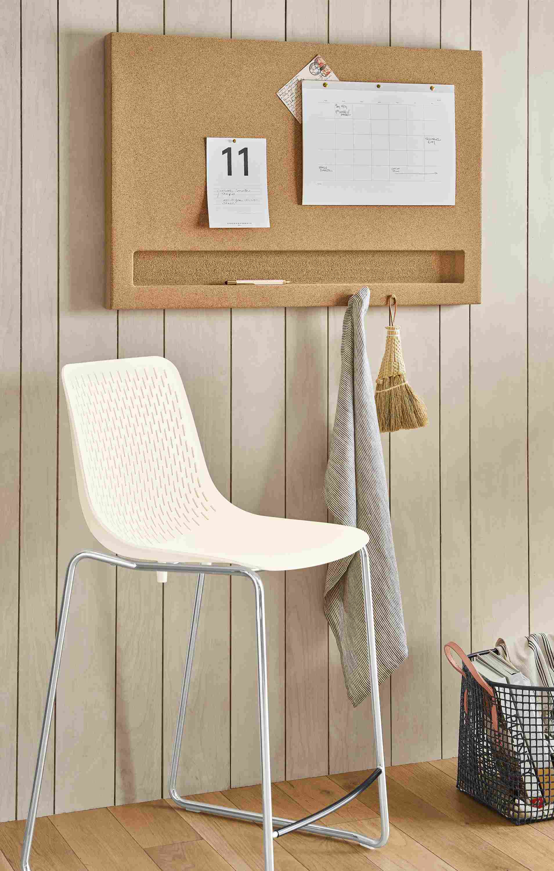 Detail of Arden cork board in entryway.
