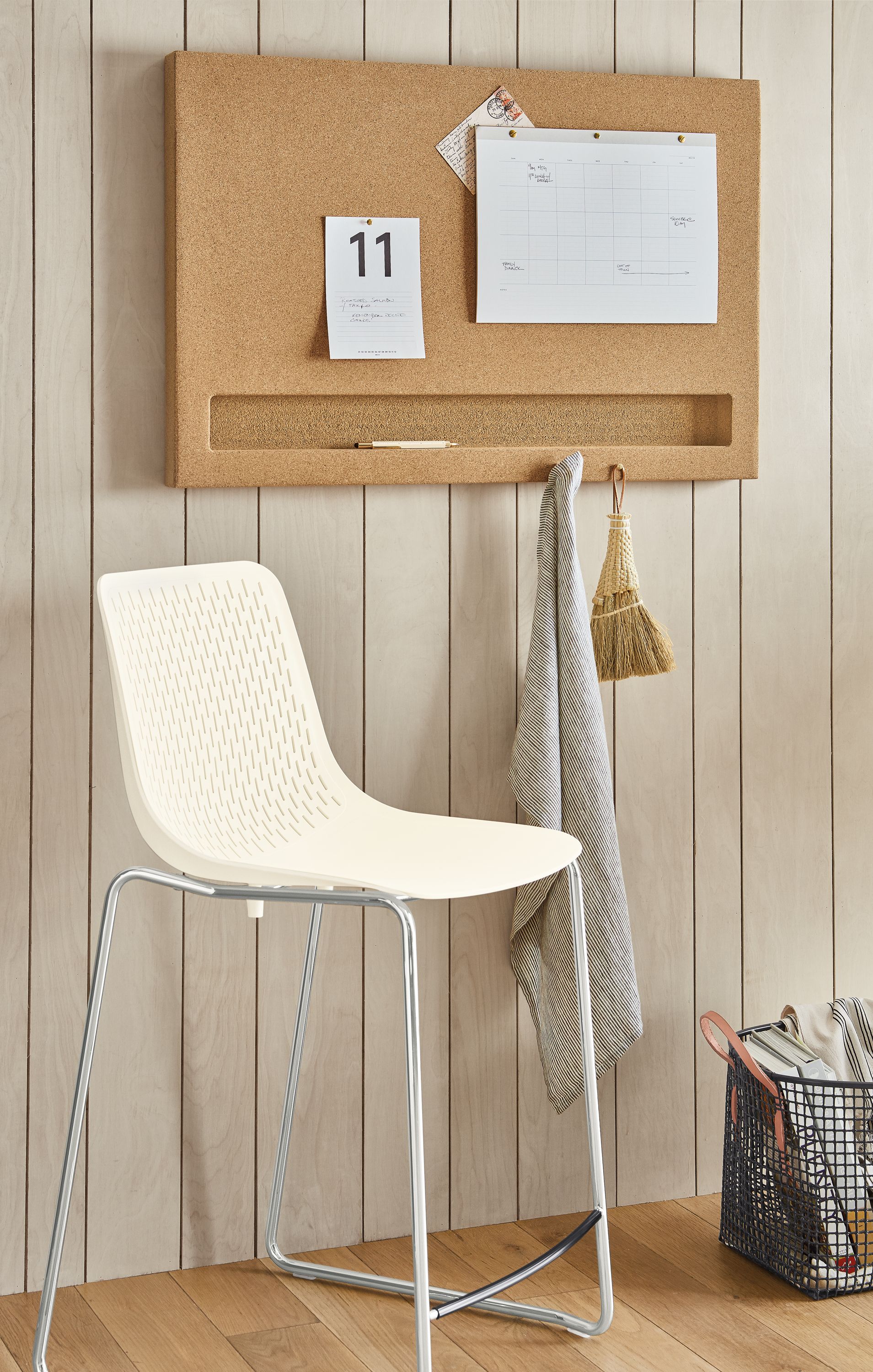 Detail of Arden cork board in entryway.