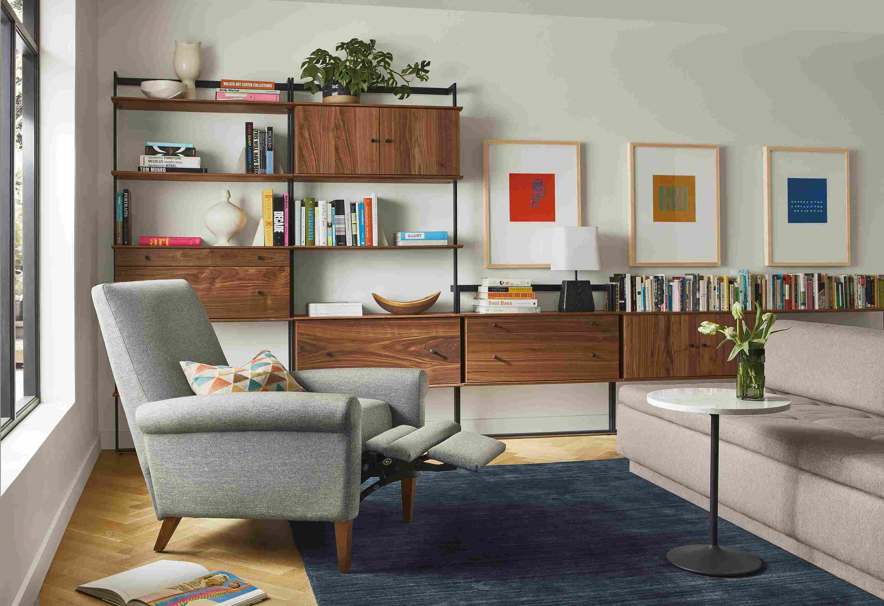 Living room with Arlo recliner extended, Beam bookcase wall unit, Miranda sectional.