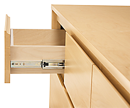 Detail of drawer slide on Arro ten-drawer dresser in maple.