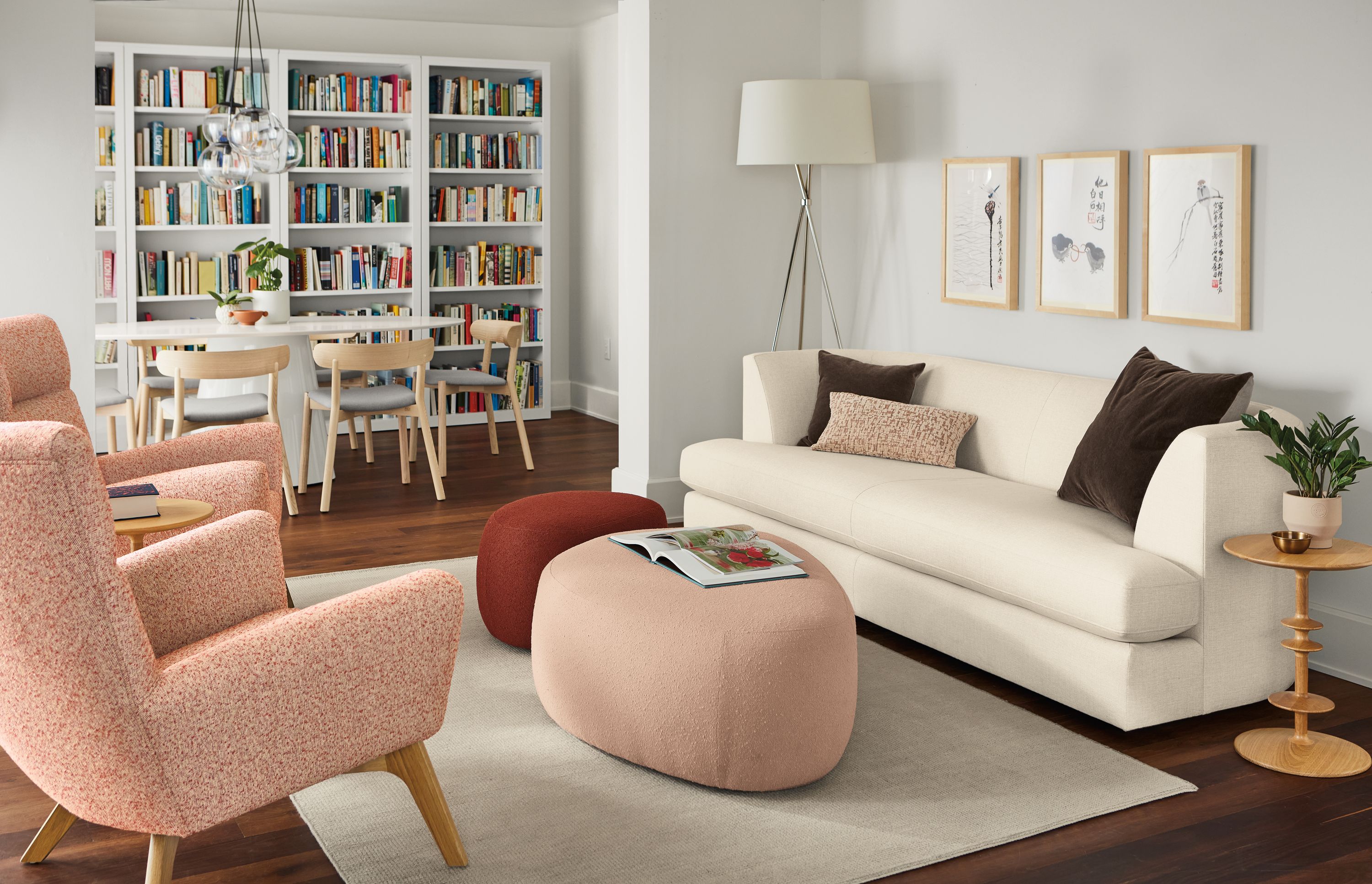 room setting with astaire sofa in sumner ivory, asher ottomans and boden chairs