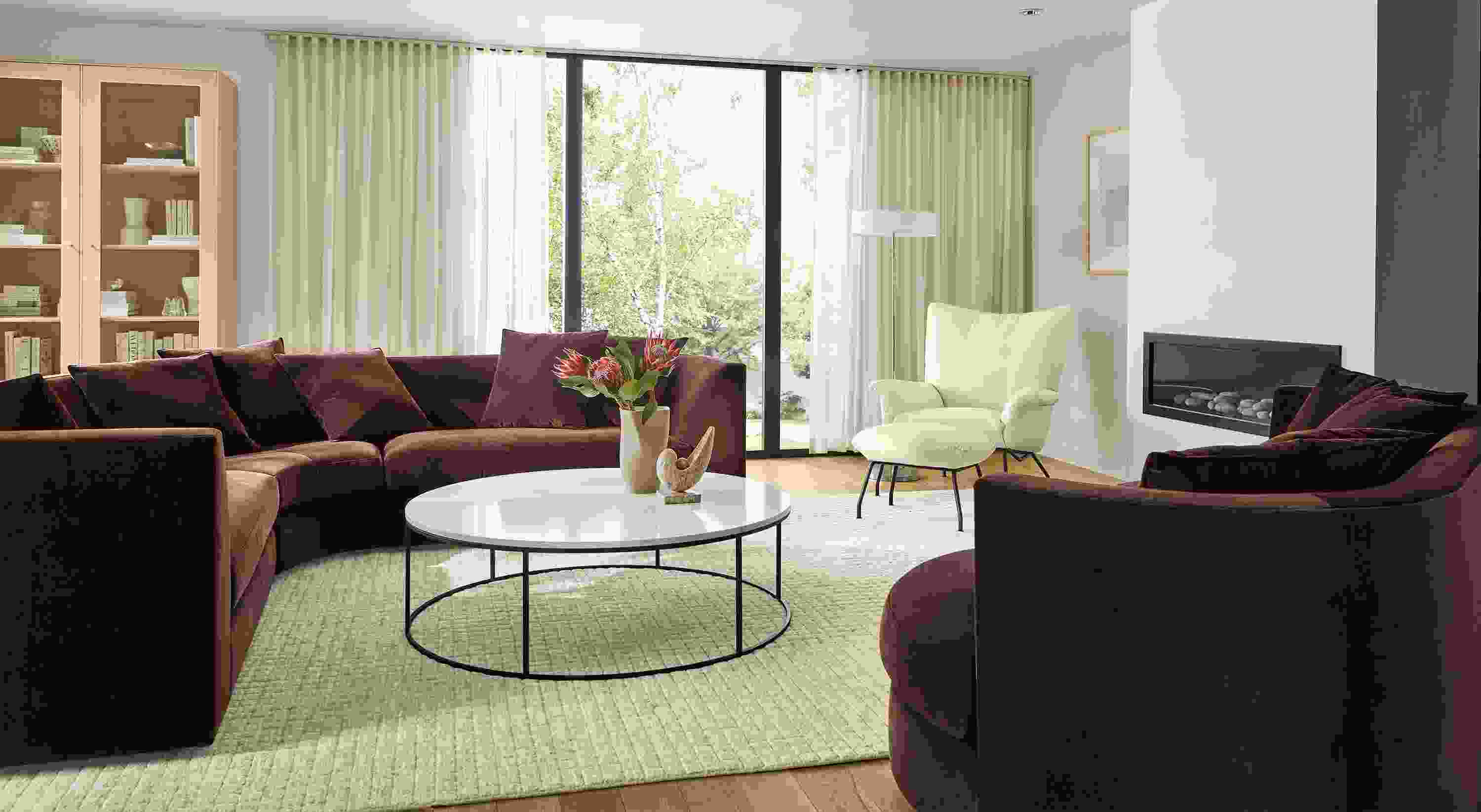 Living room with Astaire sectional and curved sofa in Redding Espresso and Tyne round coffee table with marbled white quartz top.