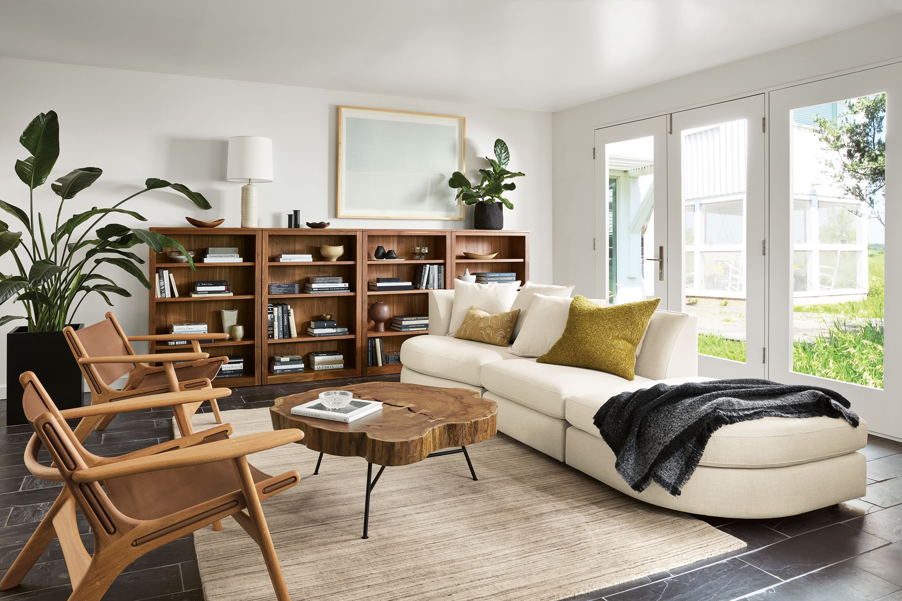 Astaire sectional configuration in Sumner Ivory with Lars Lounge Chairs in White Oak and Sellare Cognac.