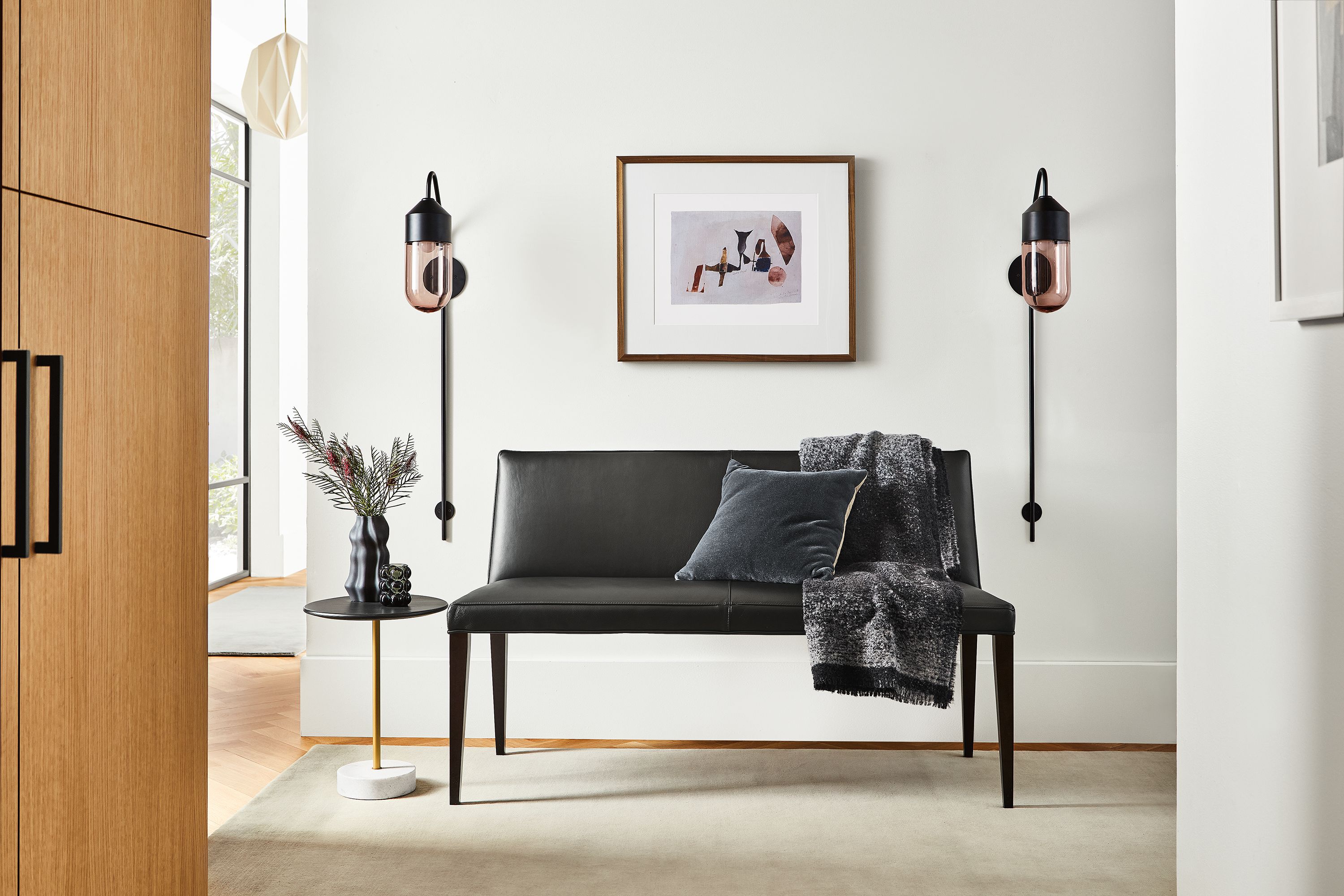 54"w bench in Laino black leather with charcoal legs